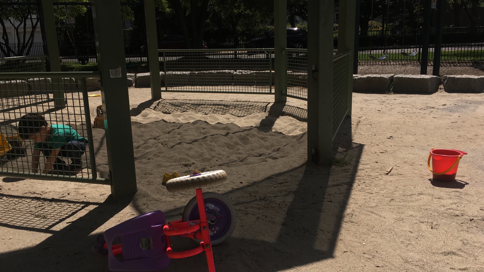 He's digging up wet sand and putting it out into the sun to dry it. A lot of work is a lot like this