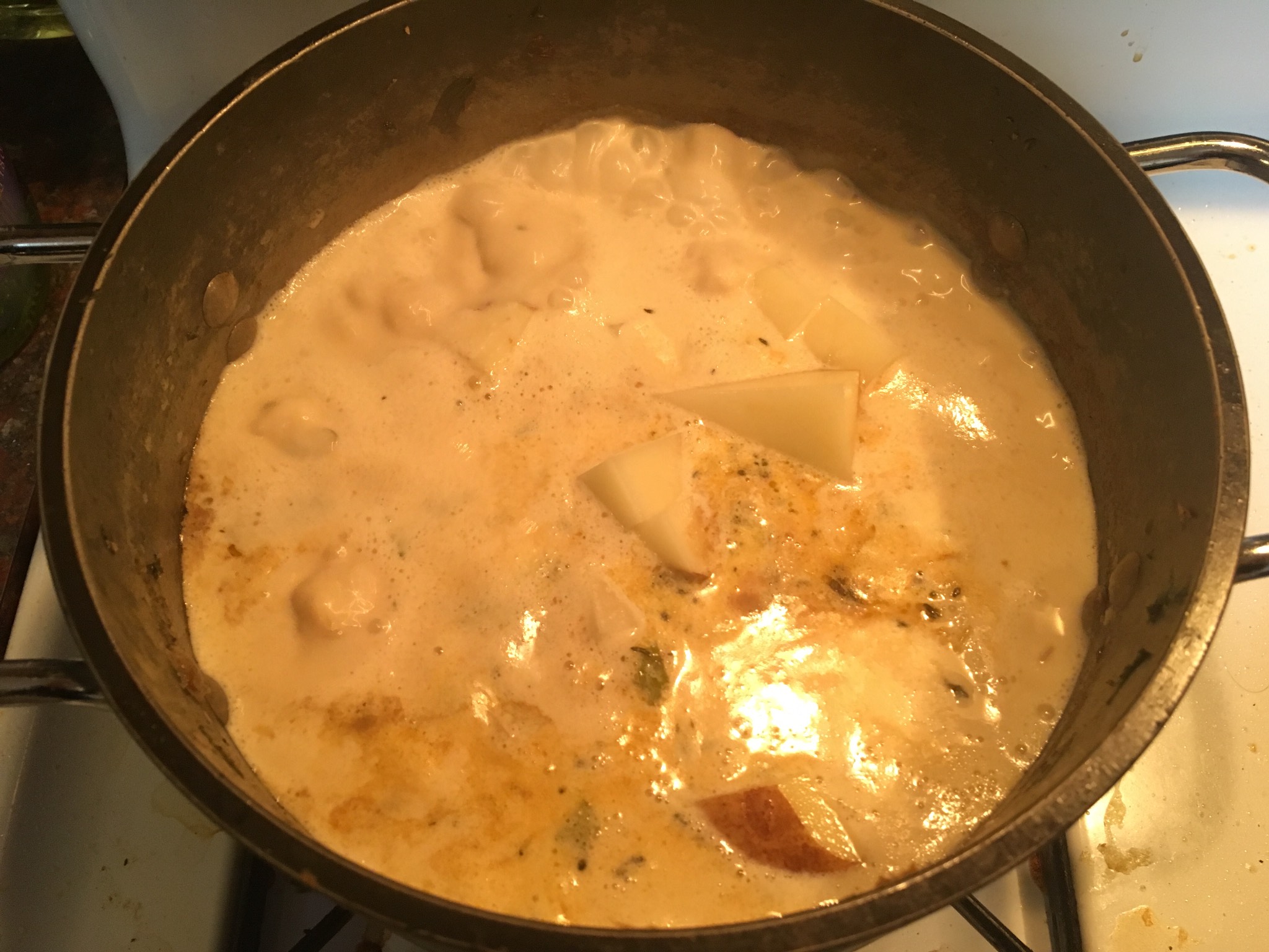 Cream's in. Added an extra potato because I put the original one in too early, and it'll probably di