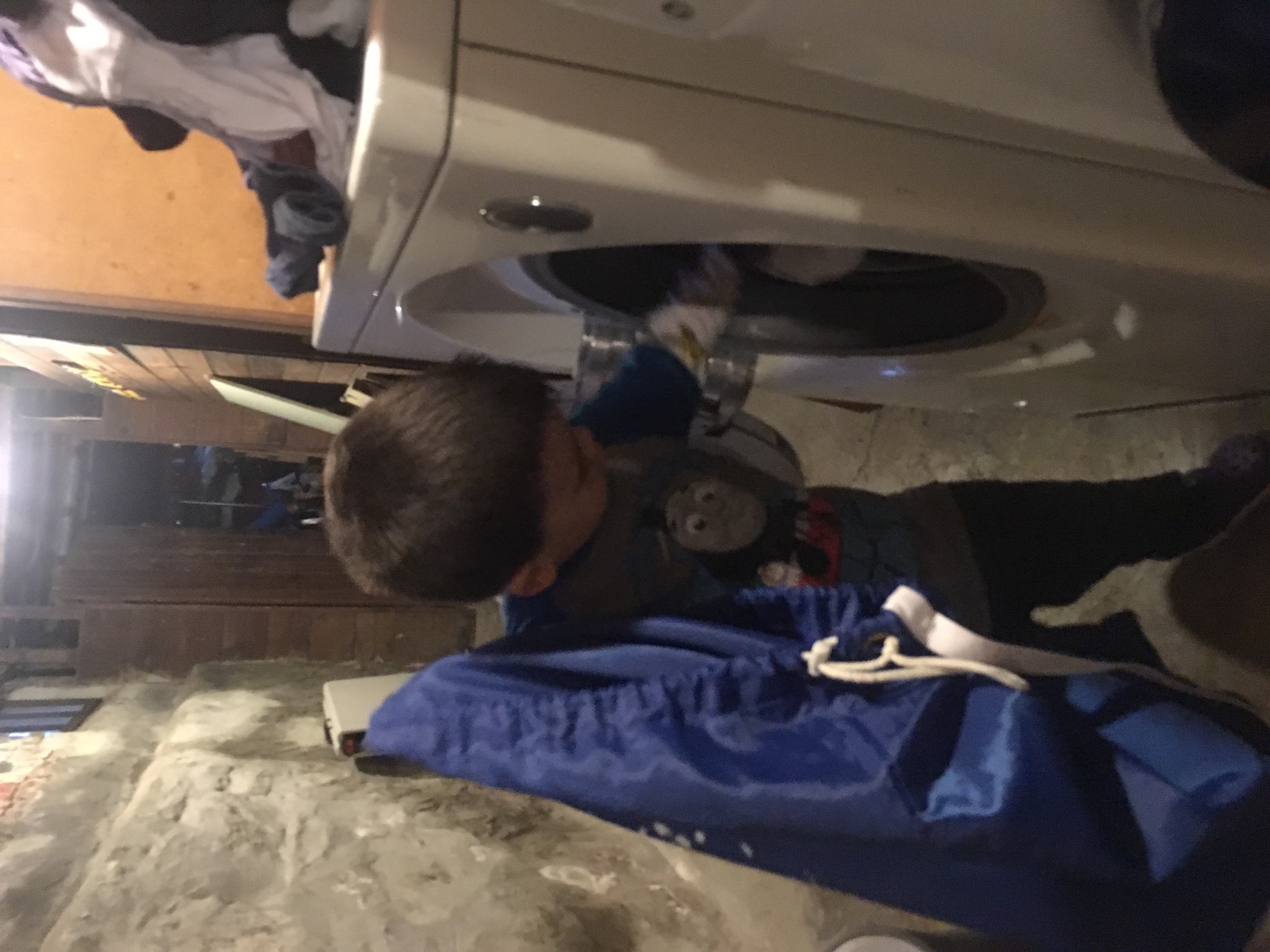 Finally putting my son to work in the laundry dungeon!
