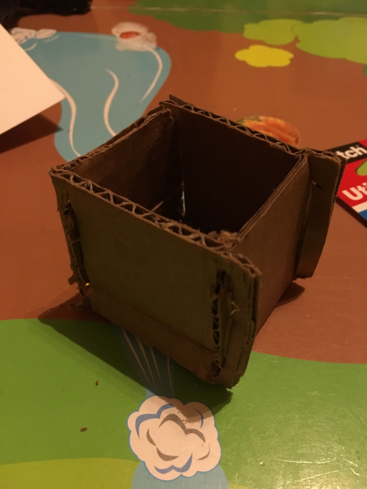 I have learned: Cutting slots and tabs for a box is extremely fiddly. Just skip those and use rubber