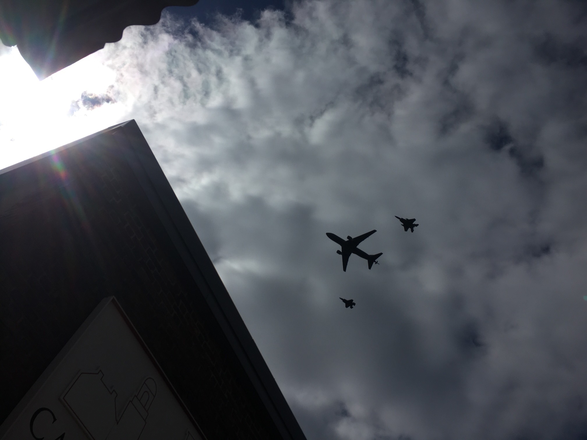 We saw this plane escorted by two fighters while waiting in line for the library. I thought it might