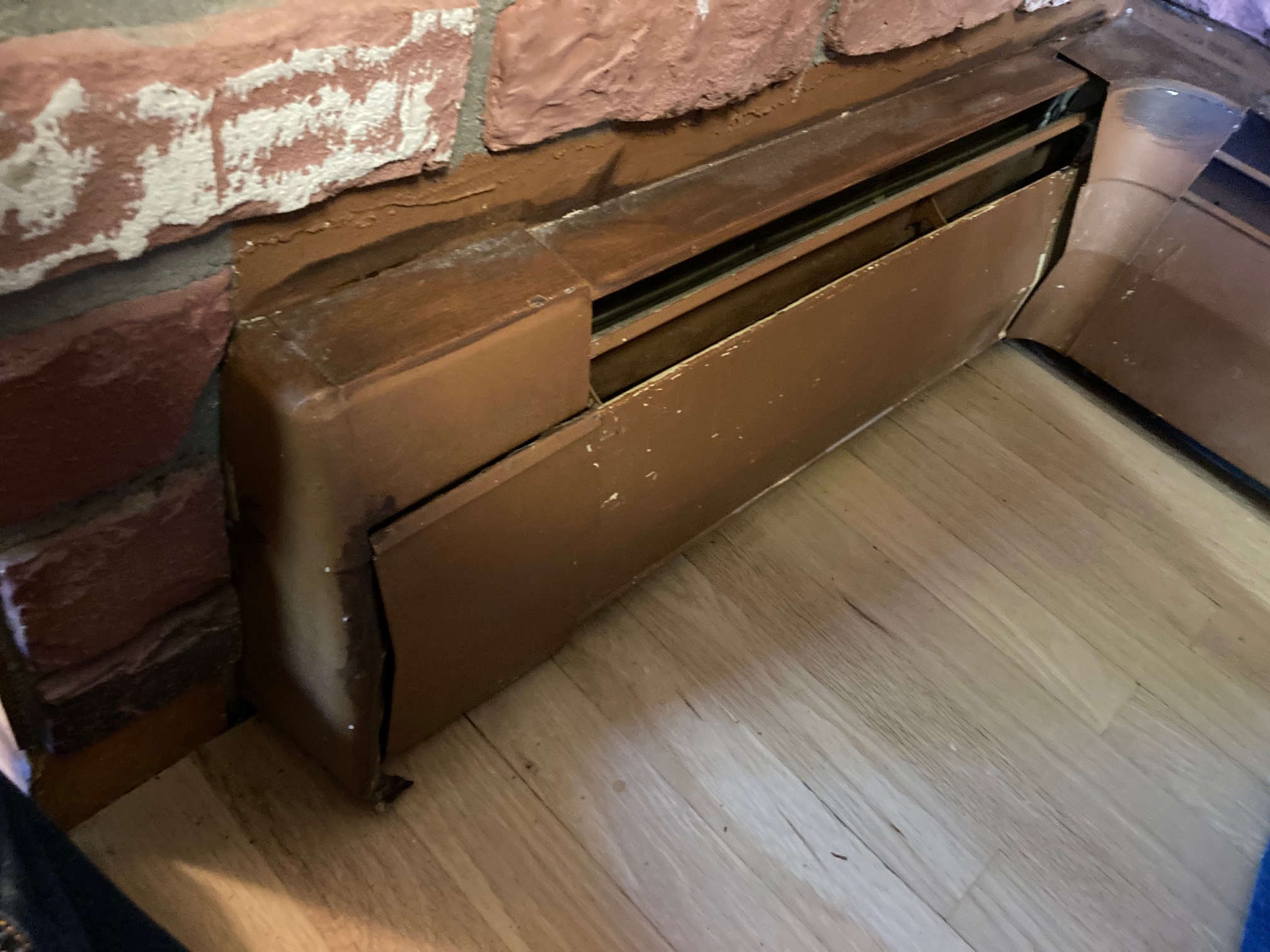 Finally got all of the wonky baseboard radiator covers on. Awkward all the way. The secret is you ac