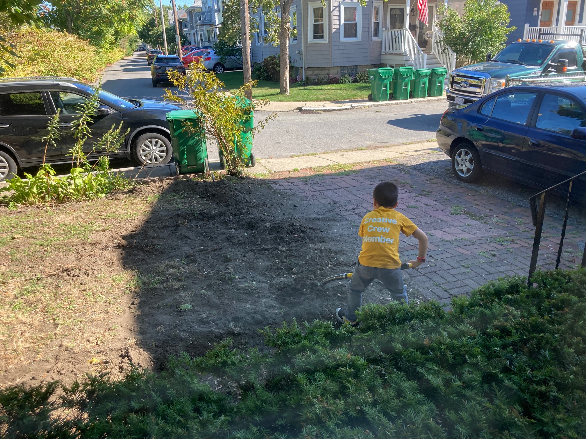 Day 2 of the guy digging the rain garden. I’m amazed this is working.