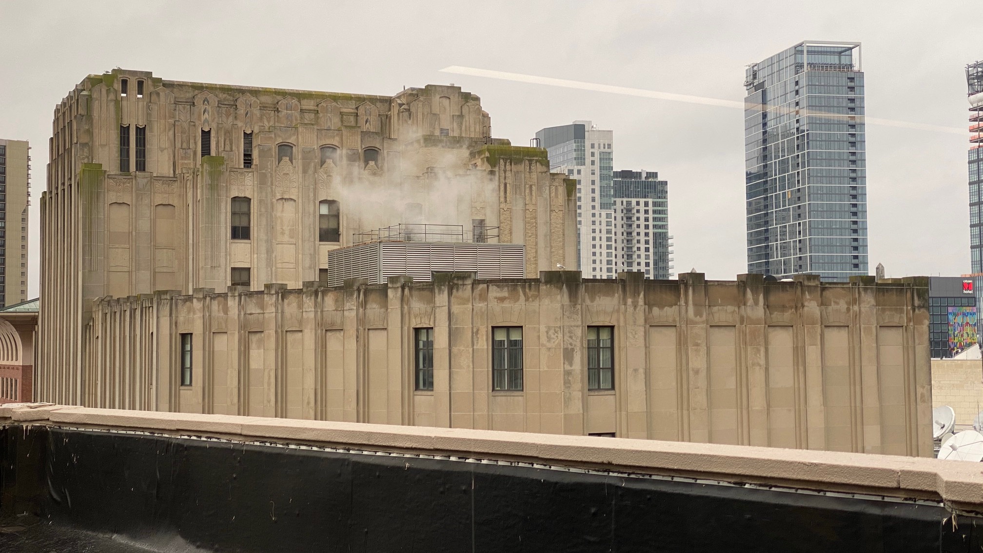 Really into this smoking building with the (possibly decorative) wall-attached columns.