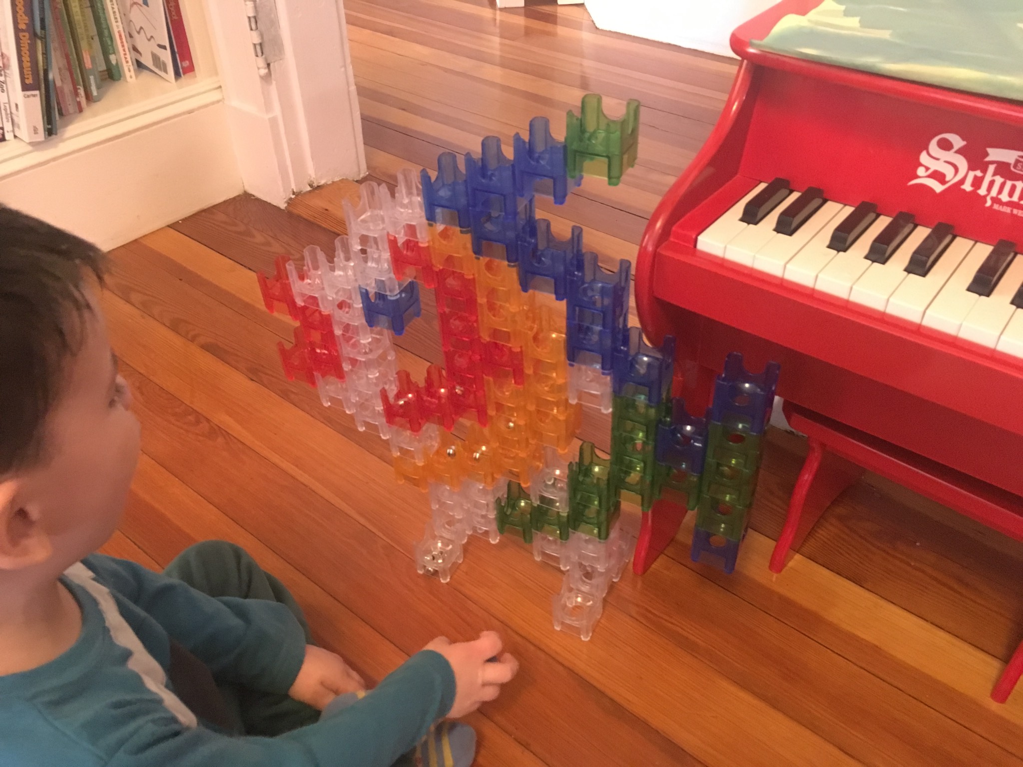 We finished building this marble run! (Which unintentionally looks like a Darwin fish.) It took over