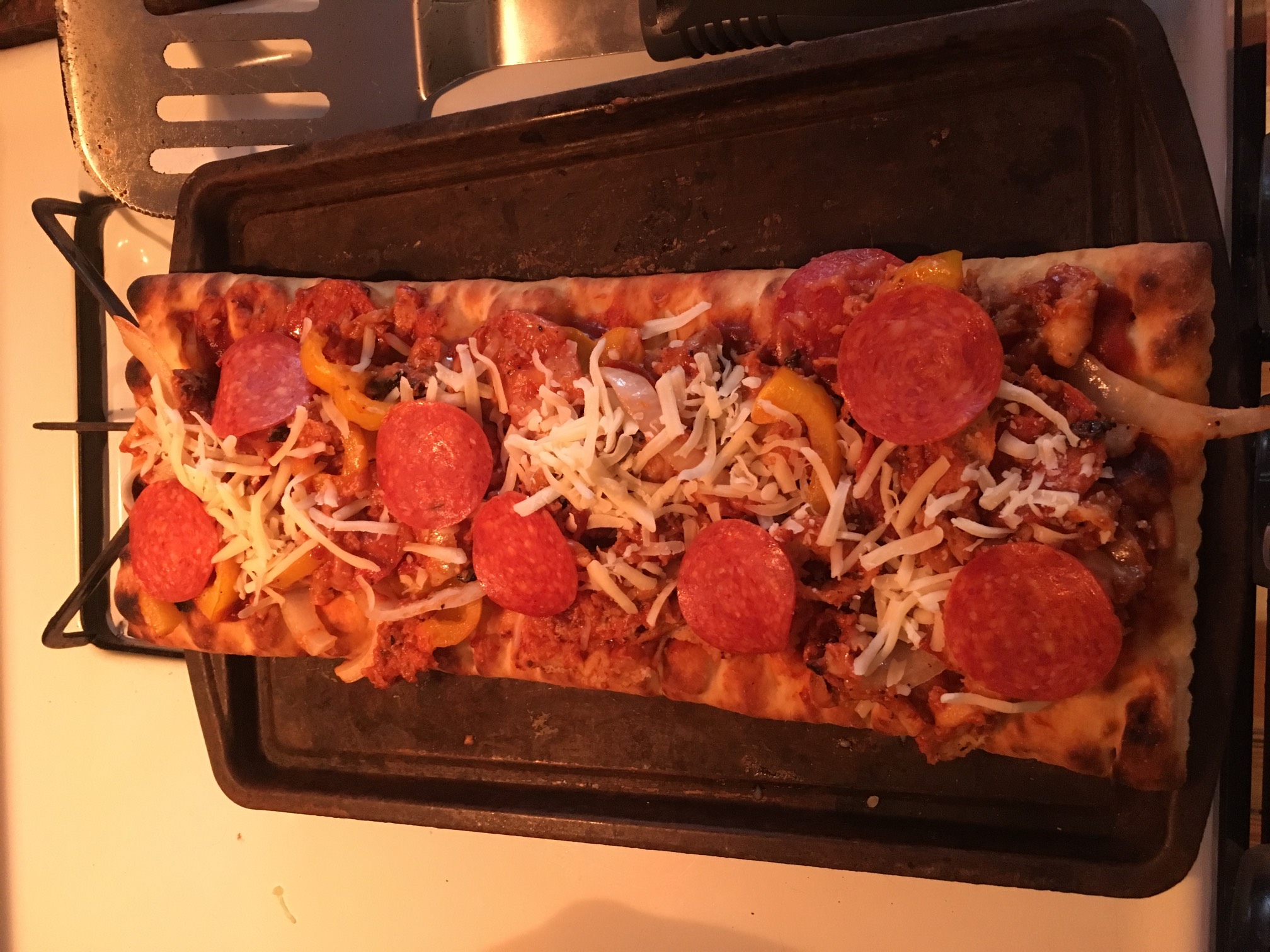 In an admittedly foolish attempt to save some of the grill failure, I scraped the toppings off the b