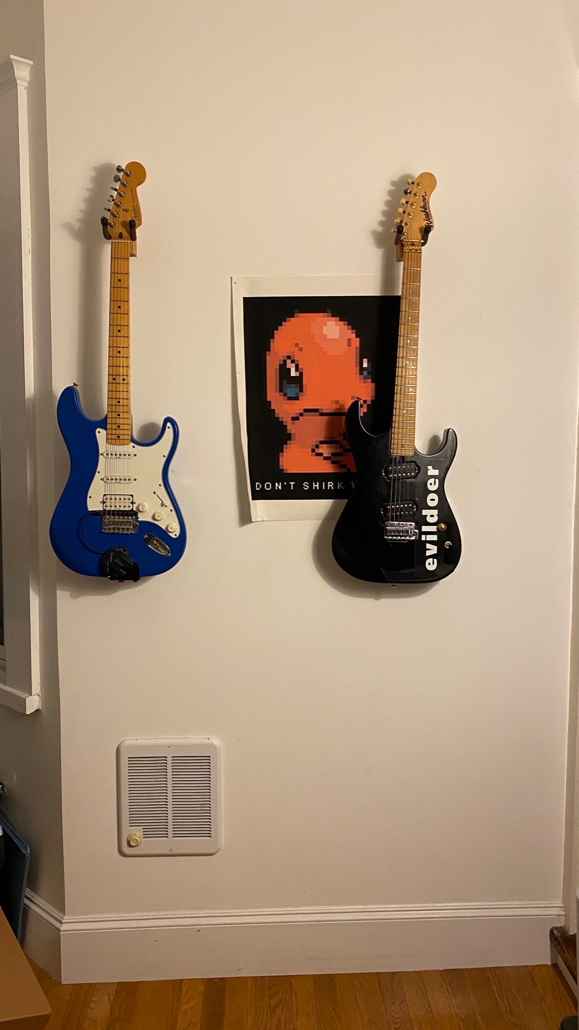Finally hung up these guitars instead of having them leaning against the wall, savage-style.