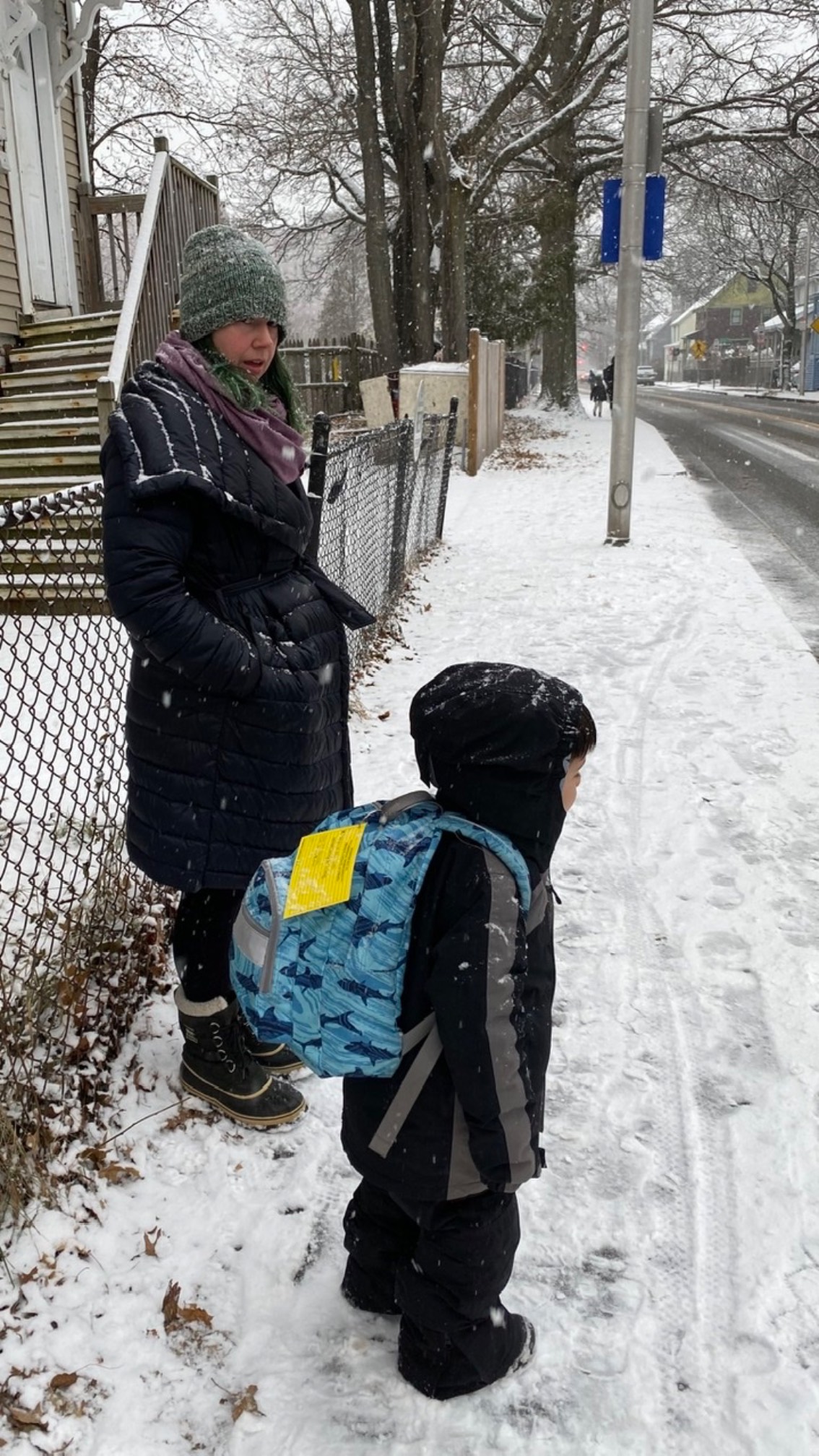 One of these people doesn’t like the snow