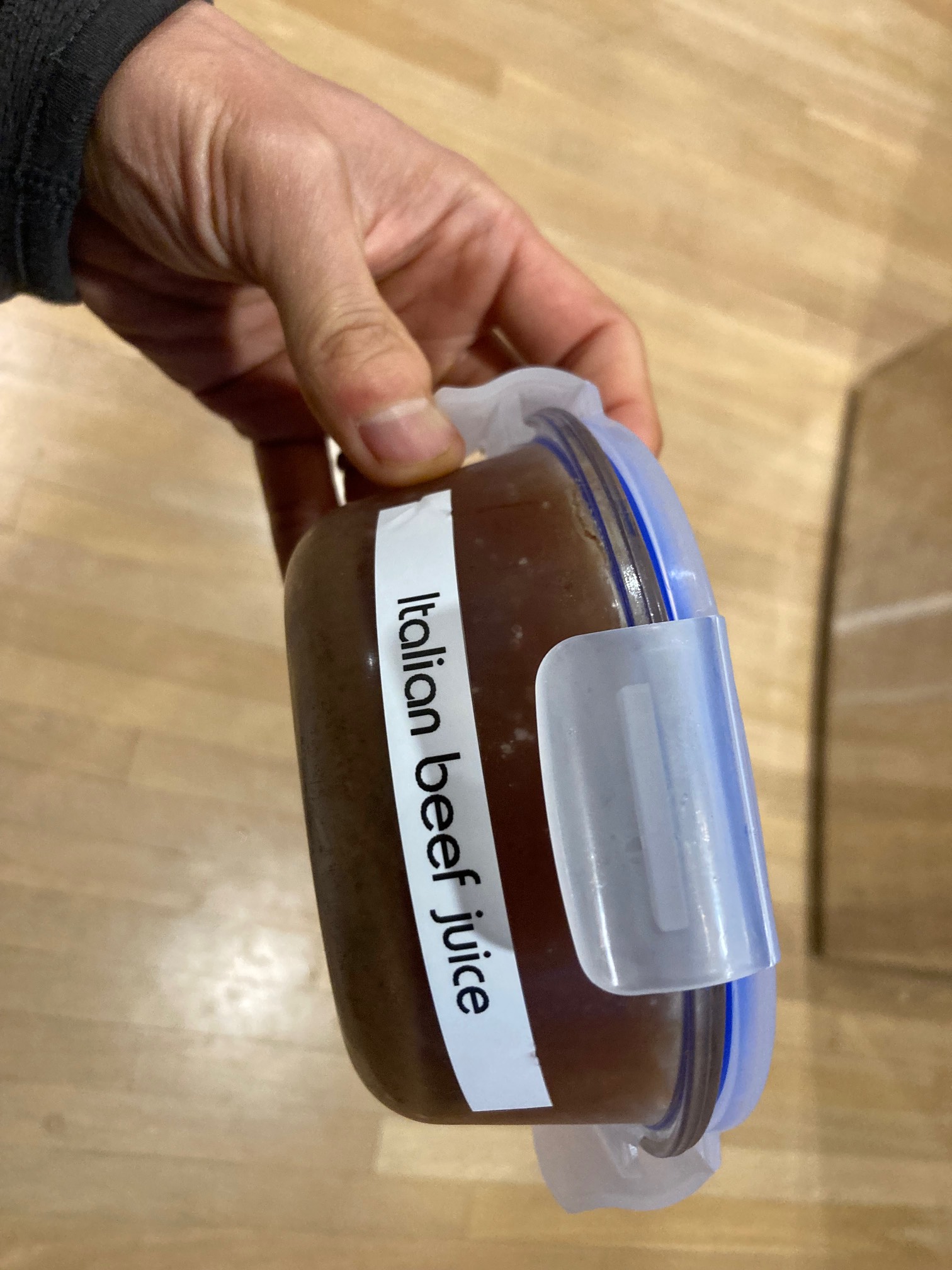 Container labeled “Italian beef juice”