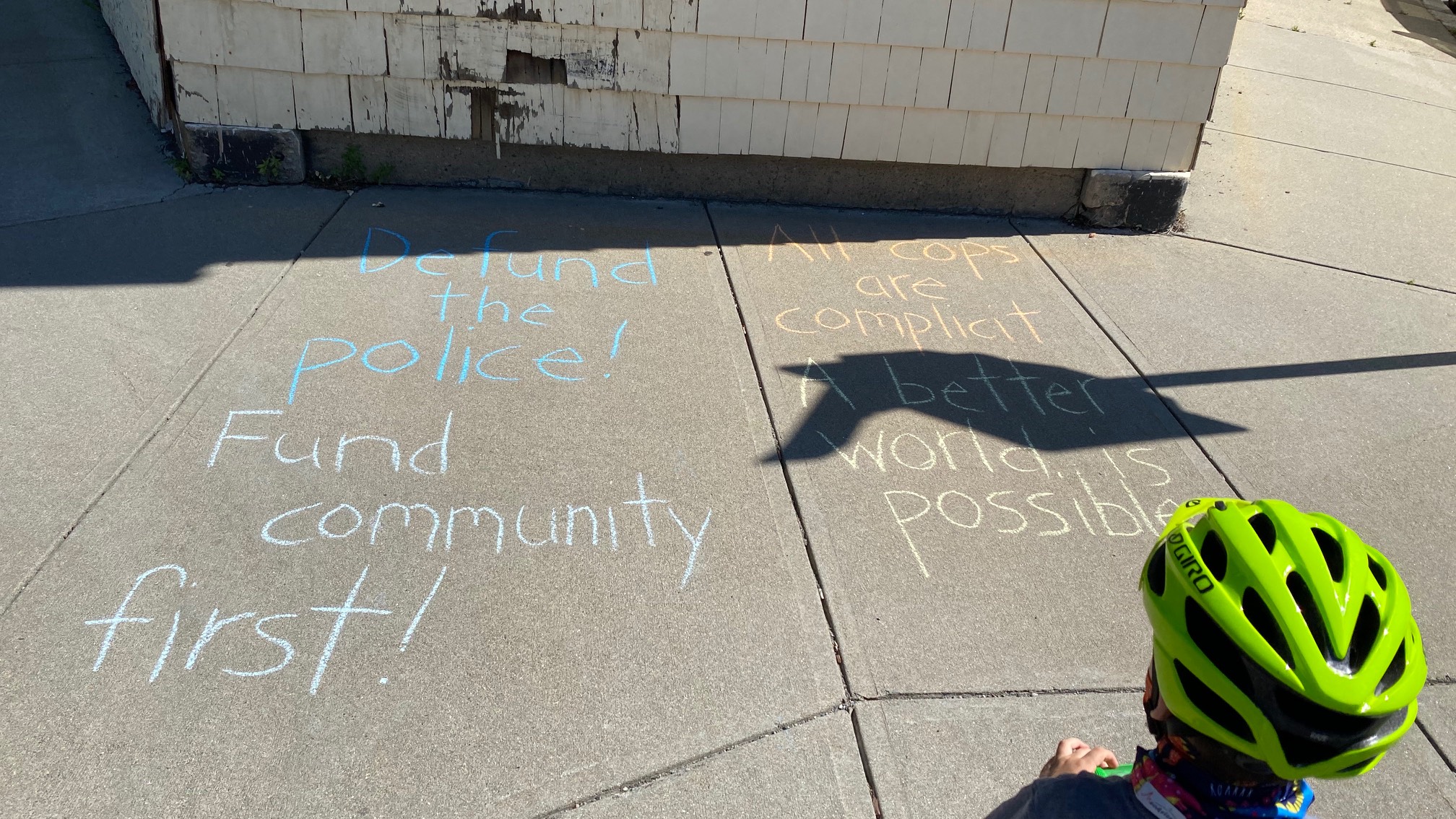 These chalk messages are really effective. The guy wanted to know what this said, and we talked abou