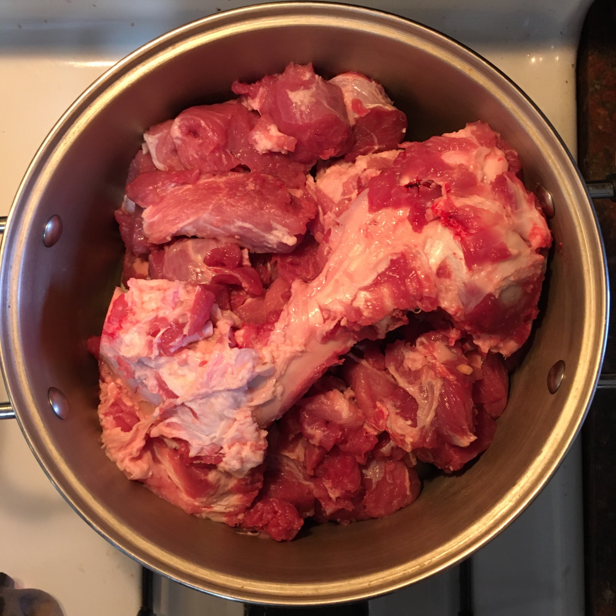 Pork shoulder. I did not realize I had gotten a bone-in shoulder. I listened to 2.5 podcast episodes