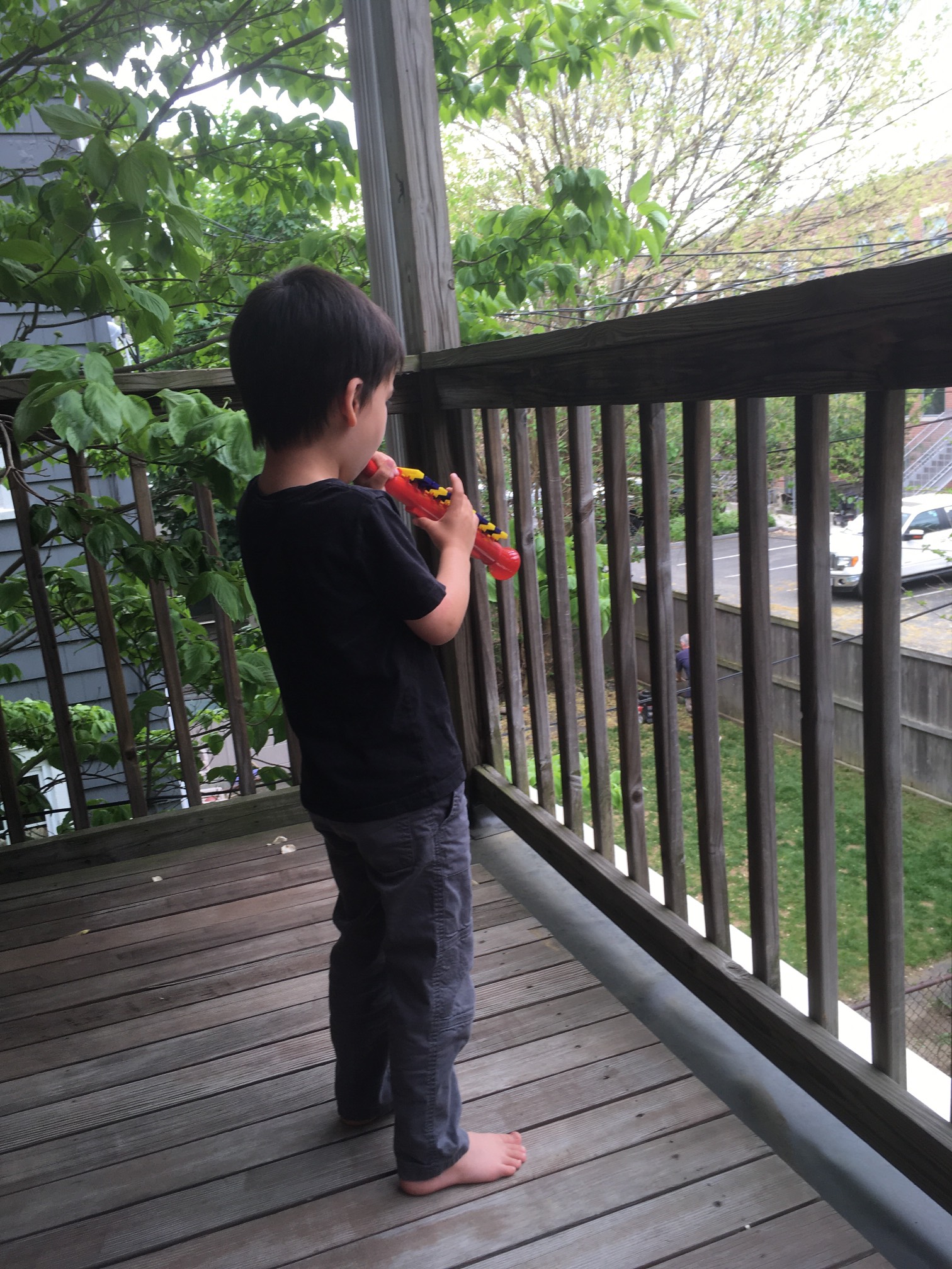 I think he’s trying to get a lawnmowing neighbor to hear him.