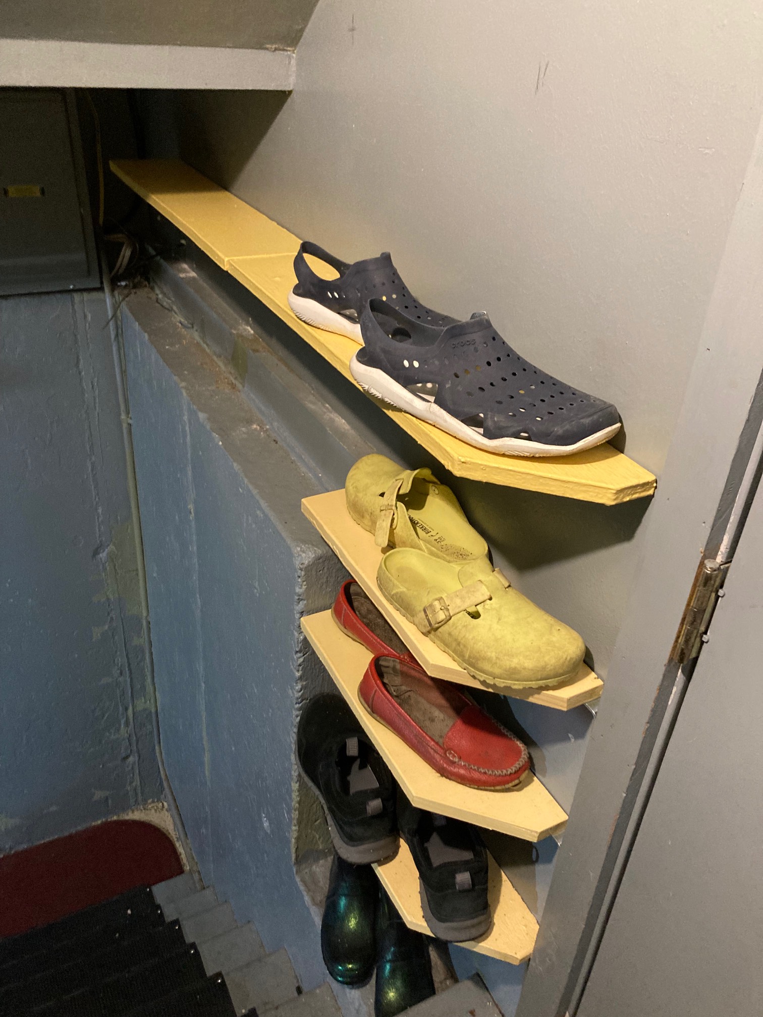 Shoe shelves with shoes on them