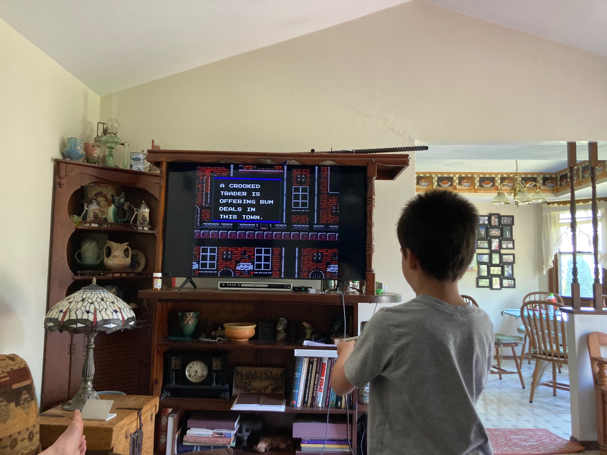 Kid playing Castlevania 2