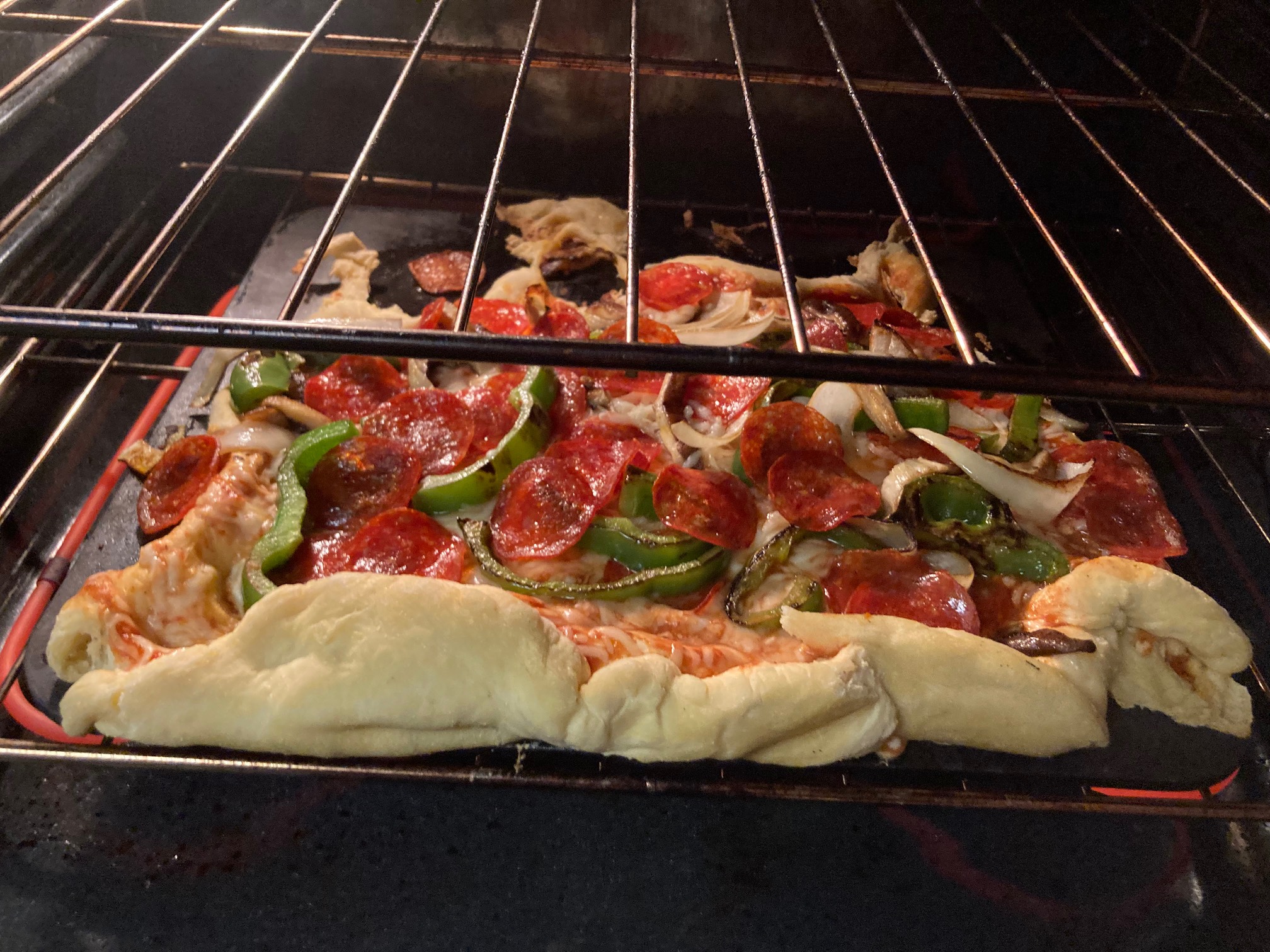 It’s been a while since we’ve had a pizza peel mishap. Well, at least it will be food.