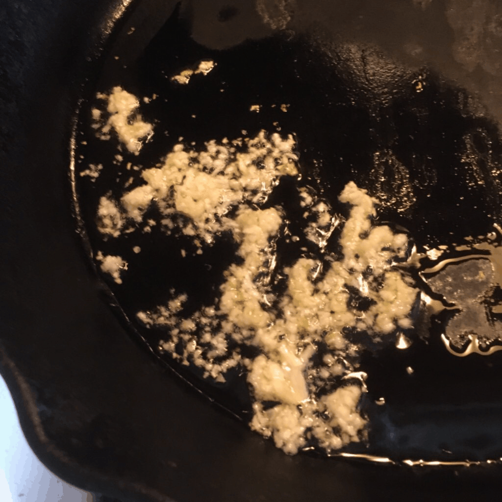 Cooking the garlic first, then taking it out, and putting it back later has really helped with not t