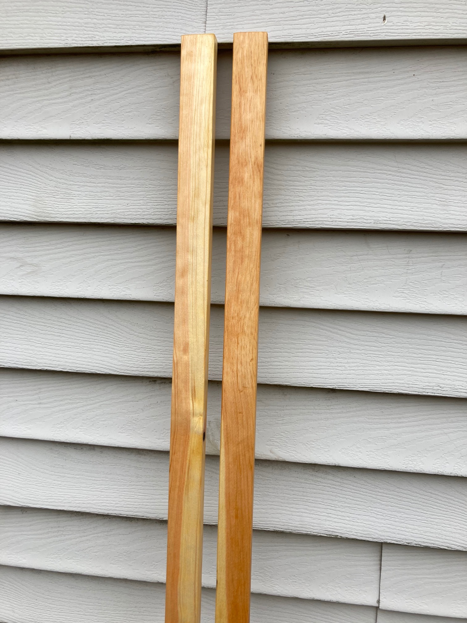 As a minimum effort to have non-crude-looking shelf standards posts, I sanded and stained these 1x2s