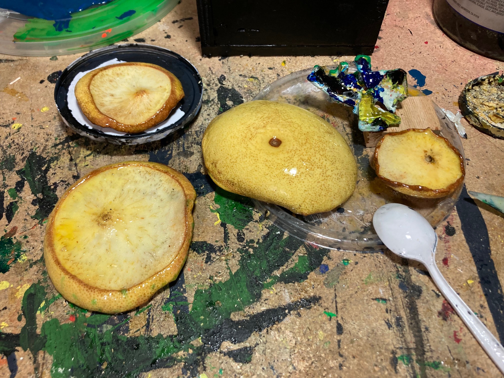 Not totally sure what the art value of resin-coating these pomelo pieces; now just doing it as a mat