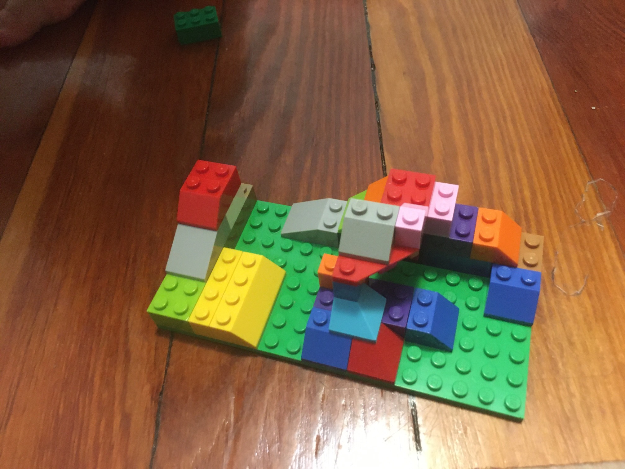 I did some ‘80s-style “build with basic pieces” Lego building. I call it Slopeland!