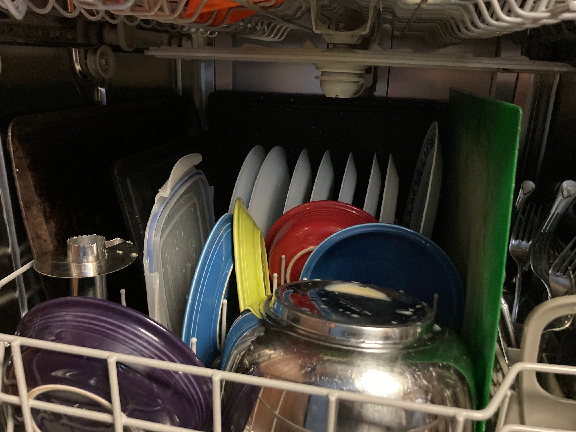 I fit three cutting boards and one baking tray in the dishwasher, and when I tested the load by spin
