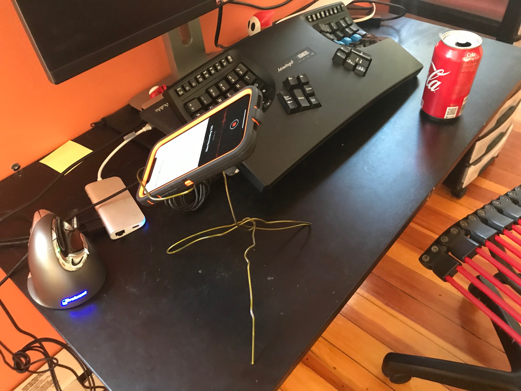 I tried to make myself a holder to keep the phone in the right position for recording podcasts, but 
