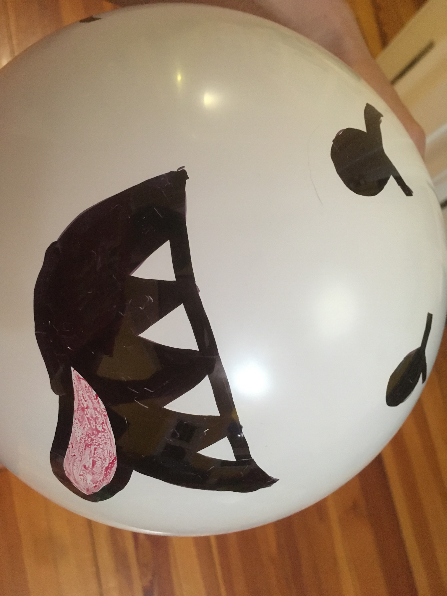 Non-permanent marker on balloon has an interesting texture.