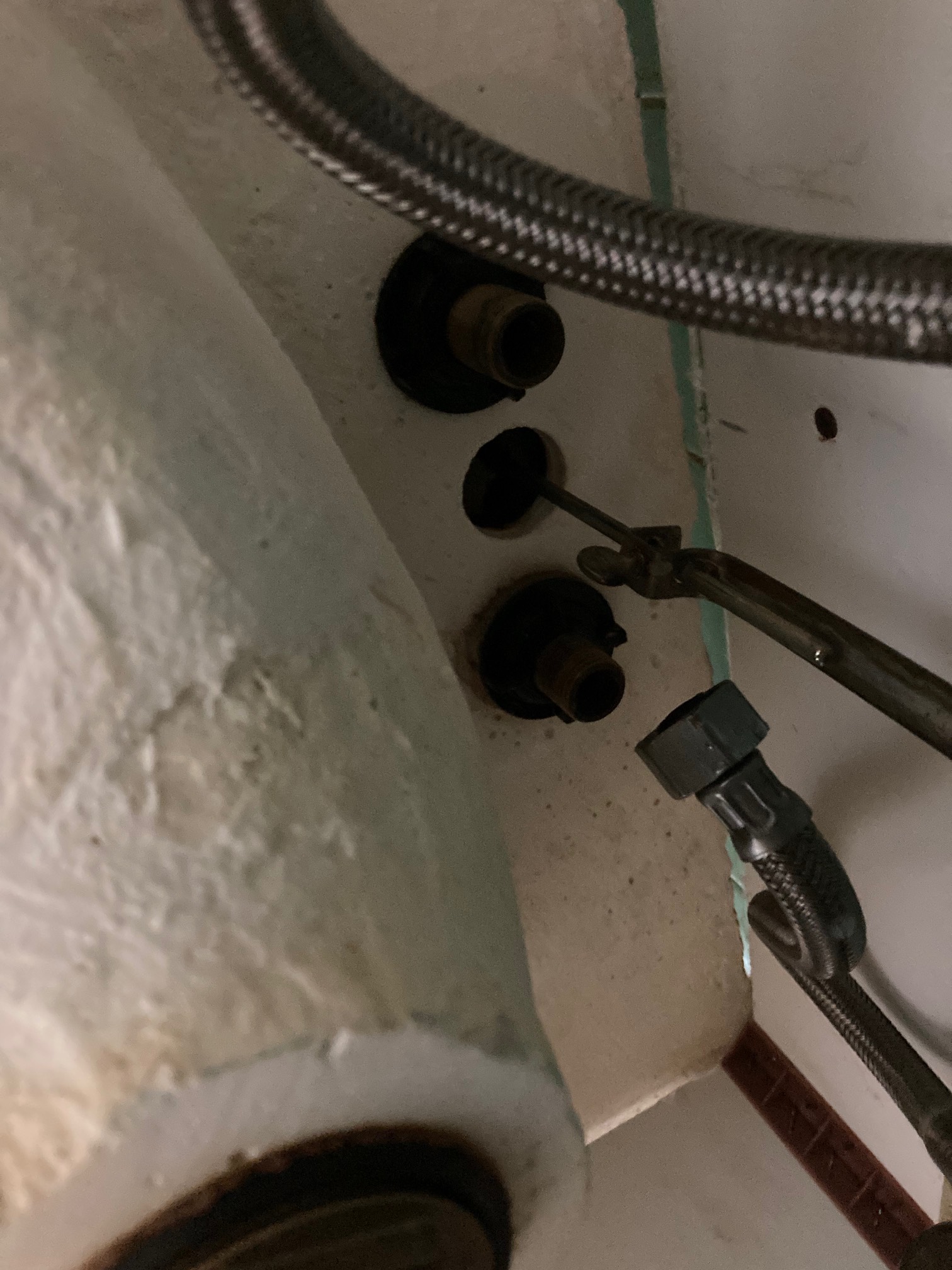 Apparently, you are supposed to use a basin wrench to remove these nuts. That’s a highly specific to
