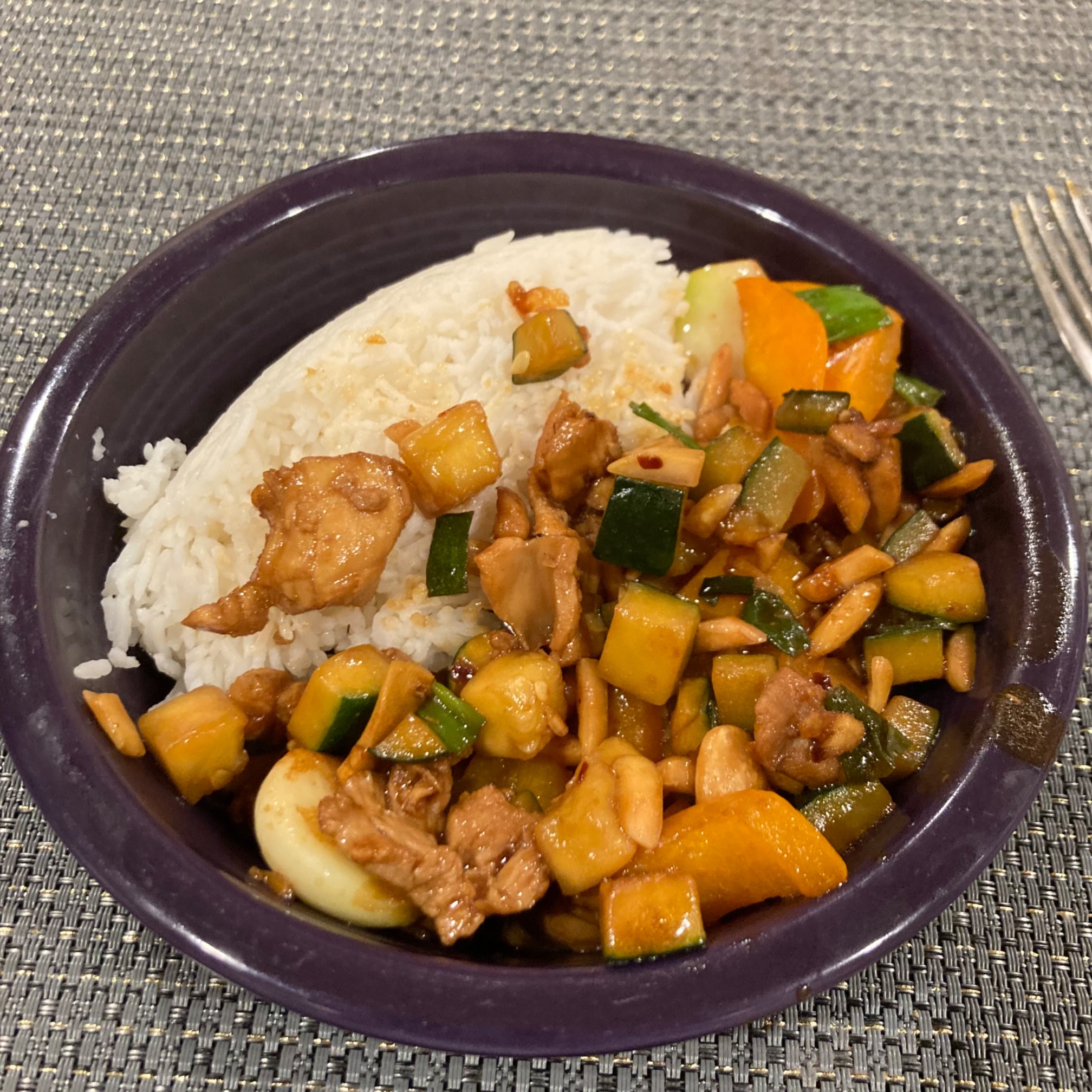 Diced chicken and vegetables on rice