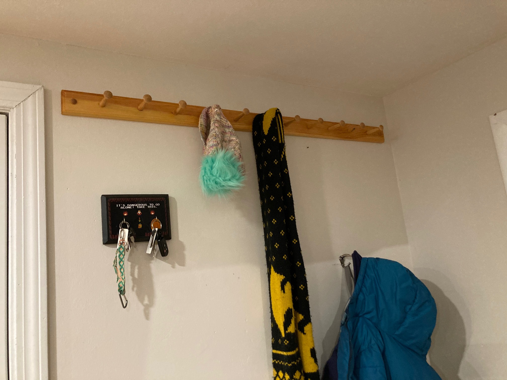 After I put up this coat rack, it occurred to me that we might not have that much stuff to hang up o