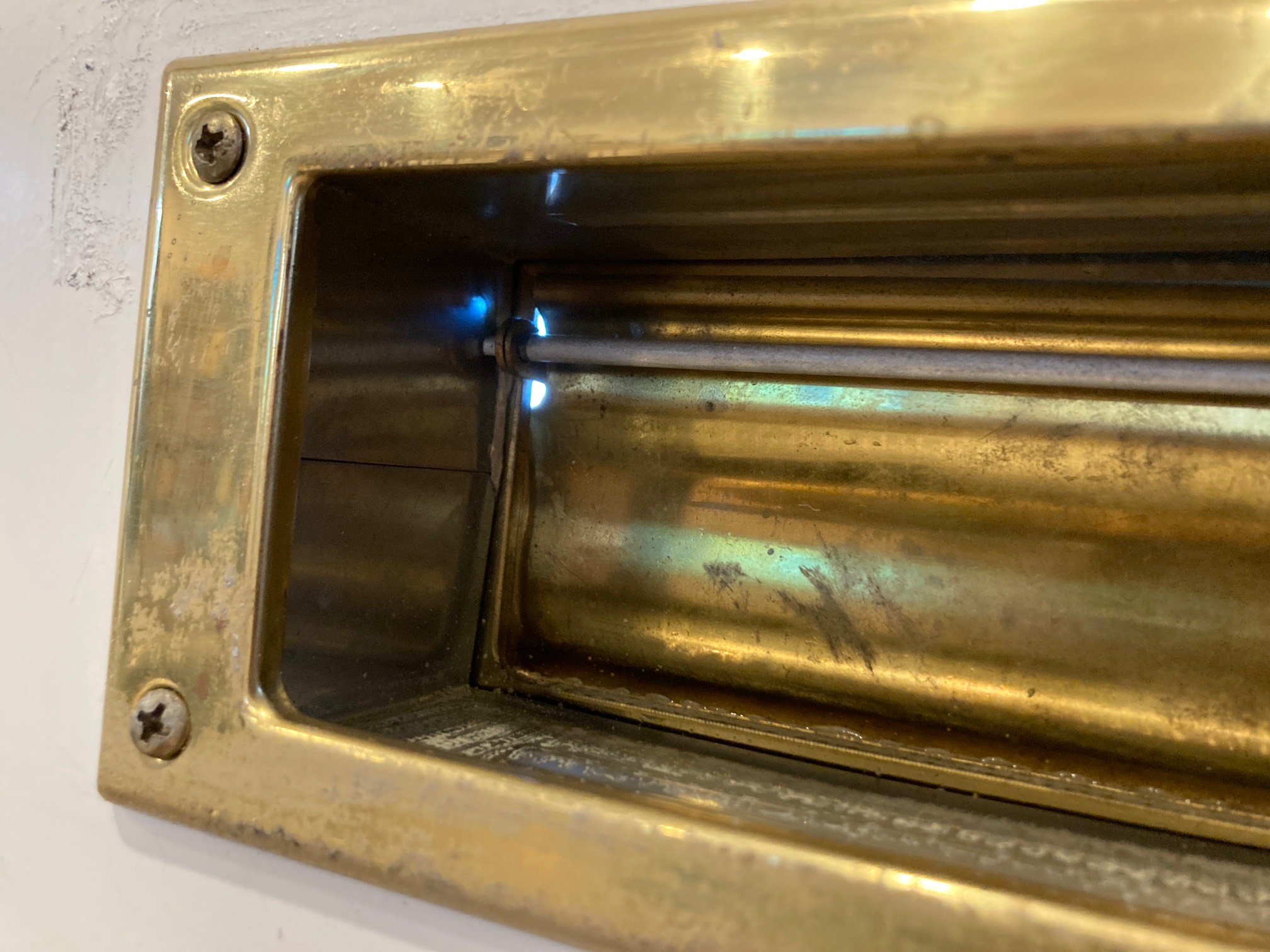Mail slot with two light leaks