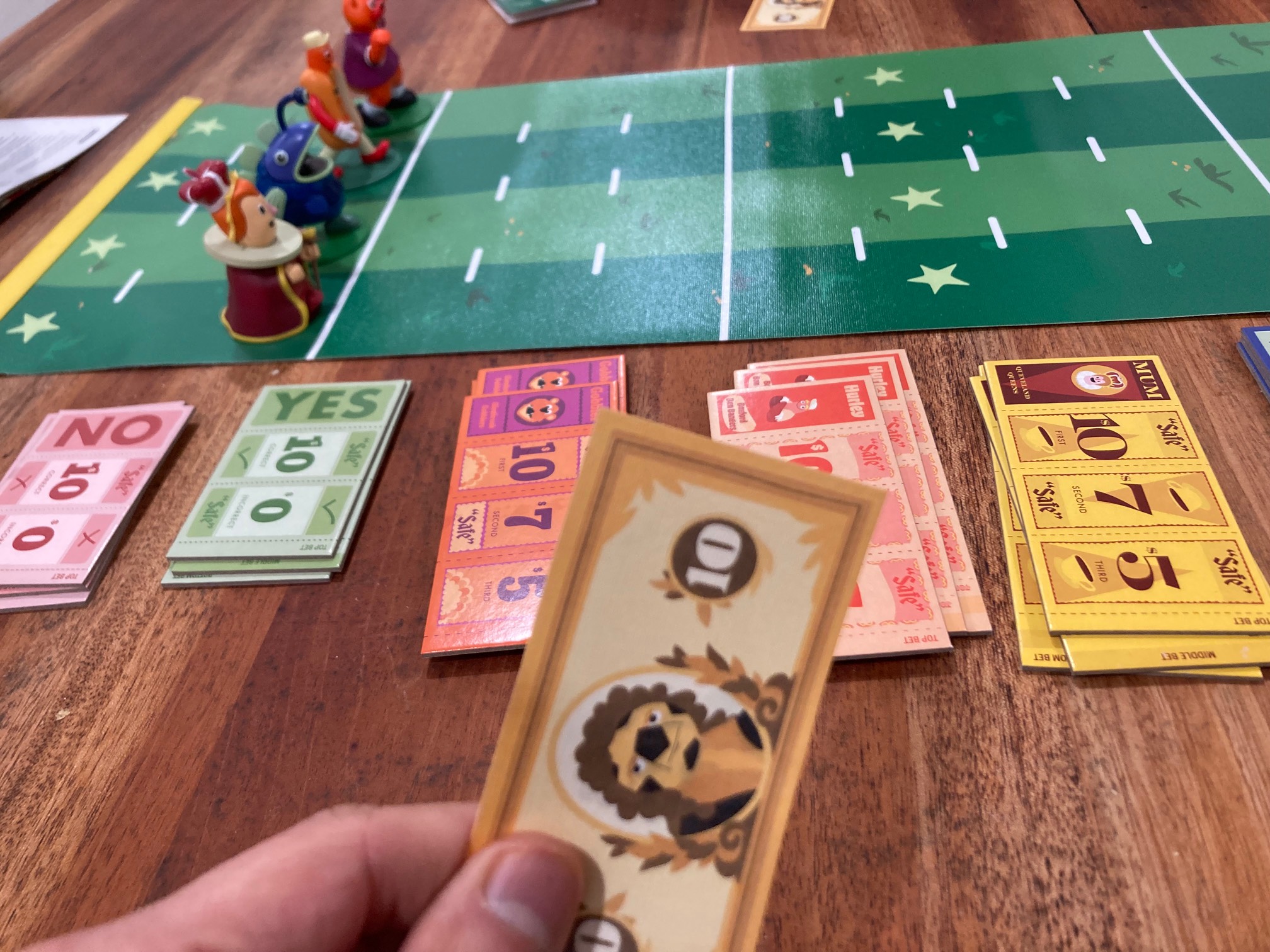 Fake cash, racers on a board