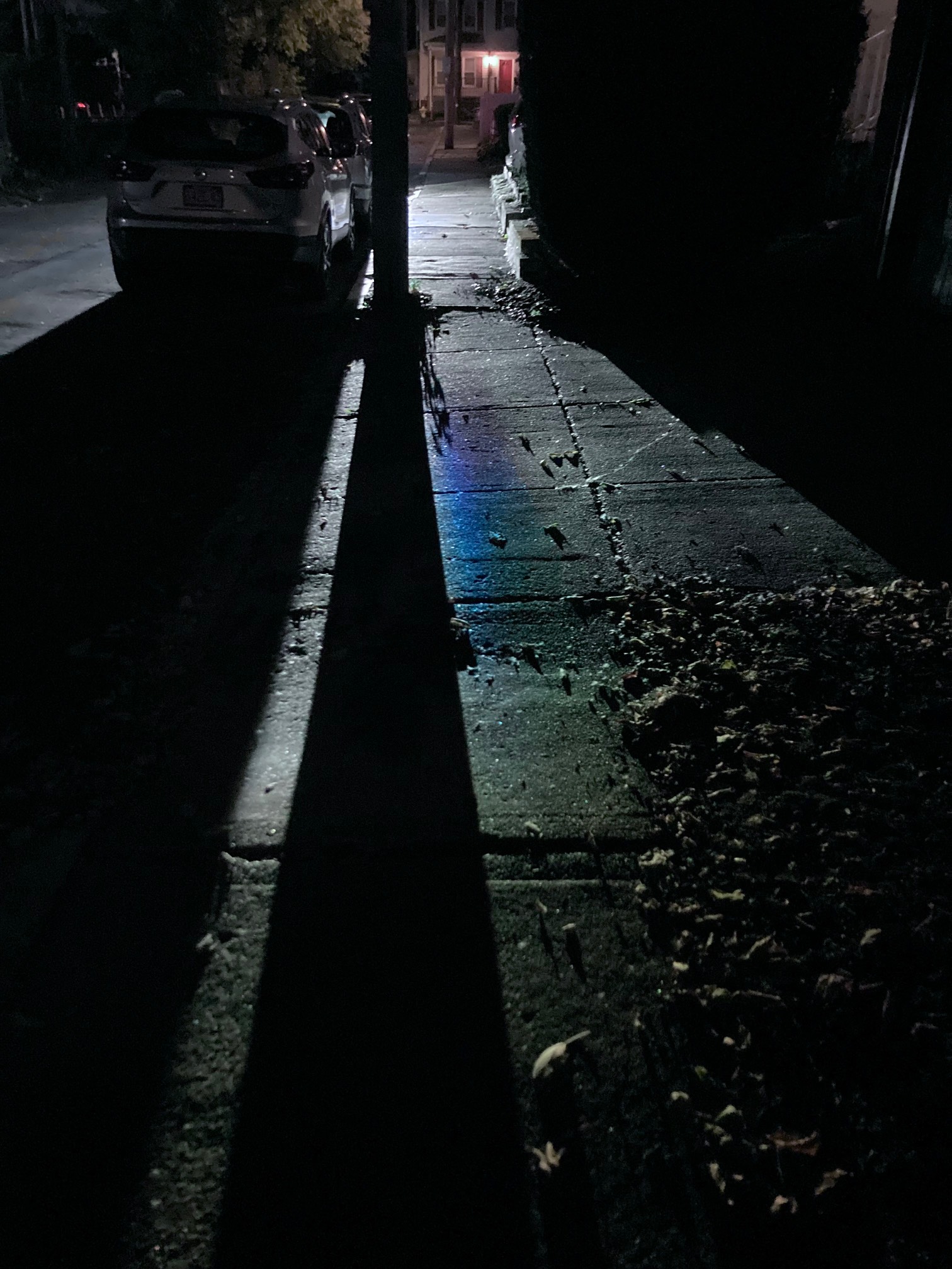 Sidewalk with rainbow sheen