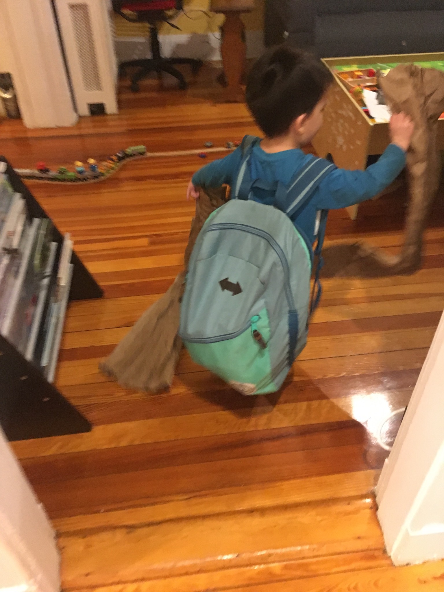 Giant backpack, giant paper snakes.