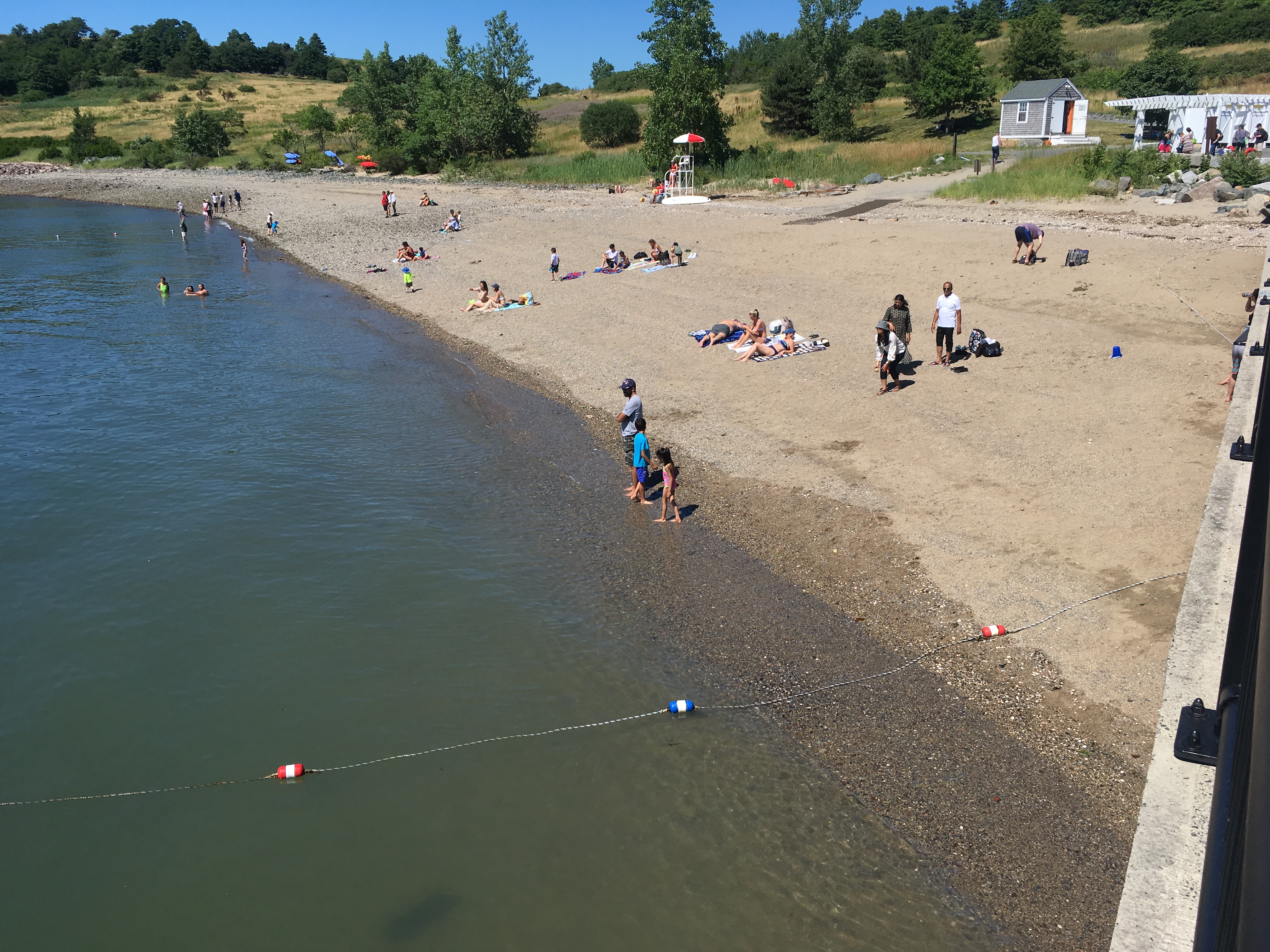 Rocky, yet peopled, beach