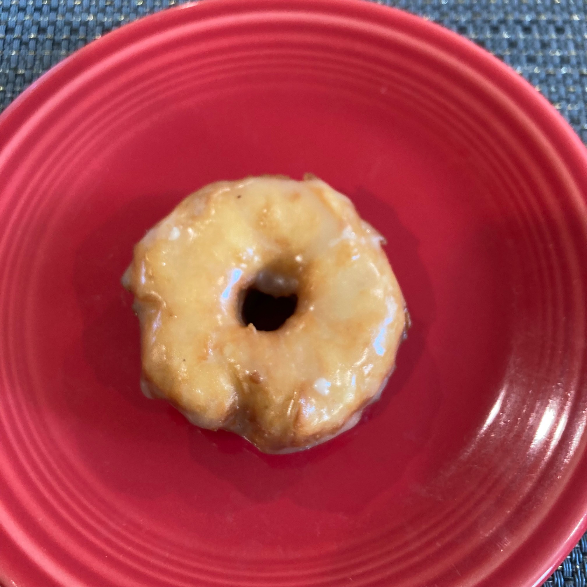 Glazed donut on plate