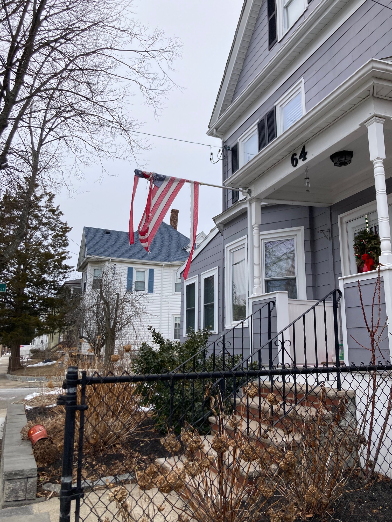 House with torn US flag on it