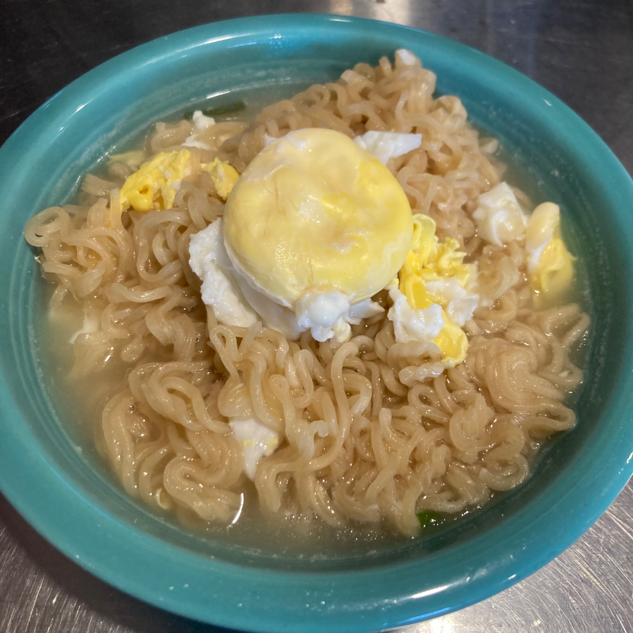 Yellow-white puff on top of ramen