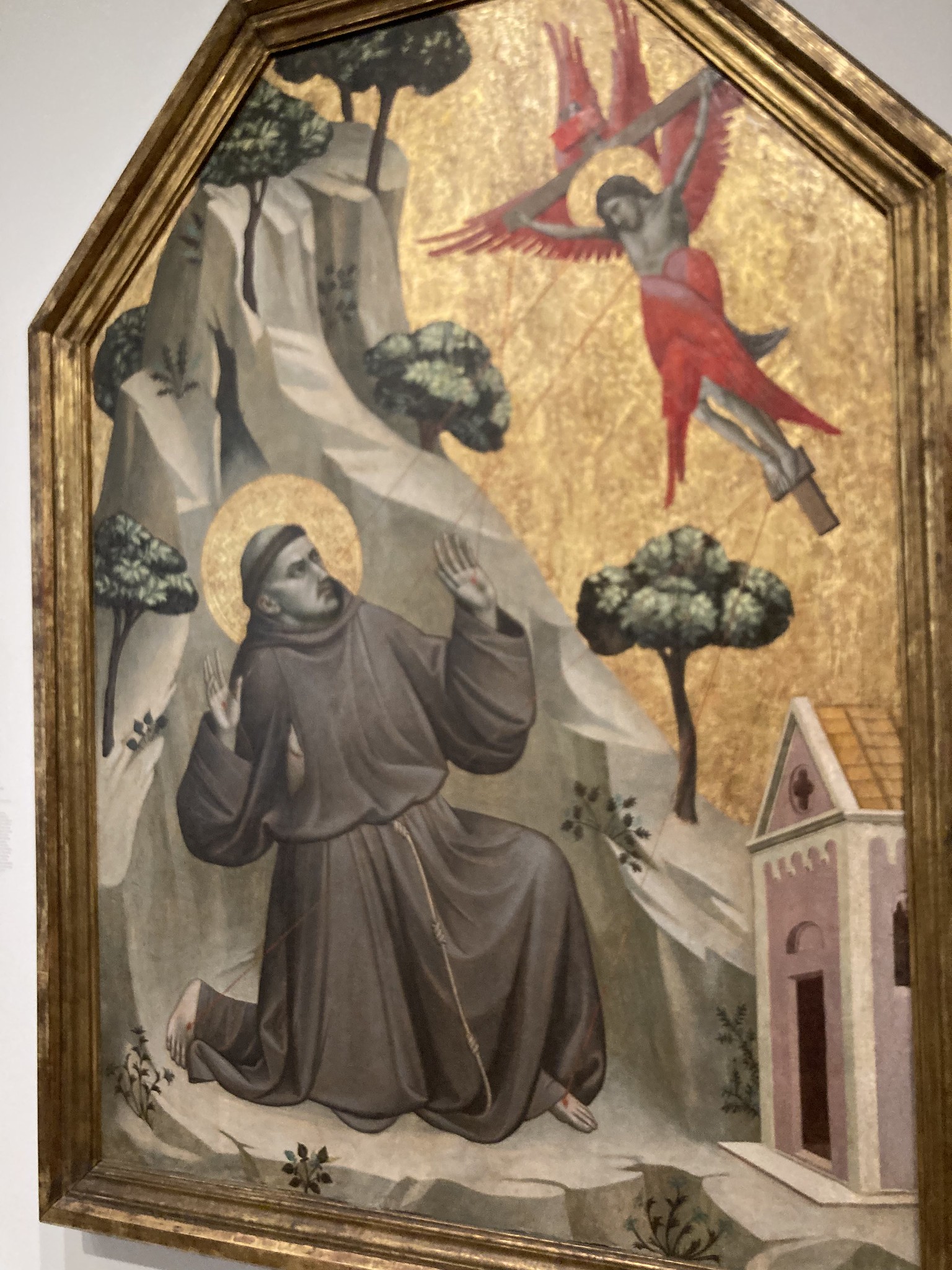 Monk and Jesus with red lines projecting from their eyes