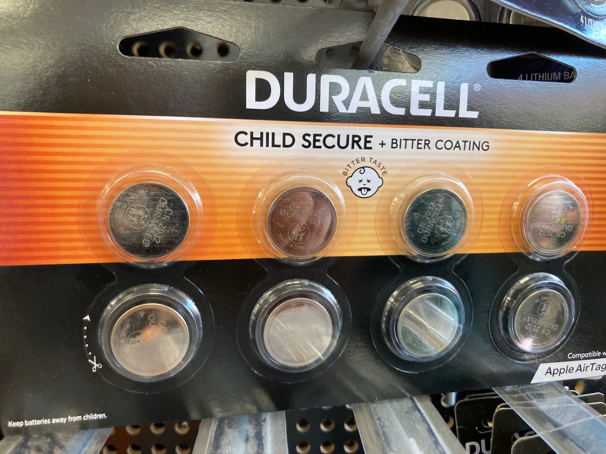 Duracell package with “child secure bitter coating” label