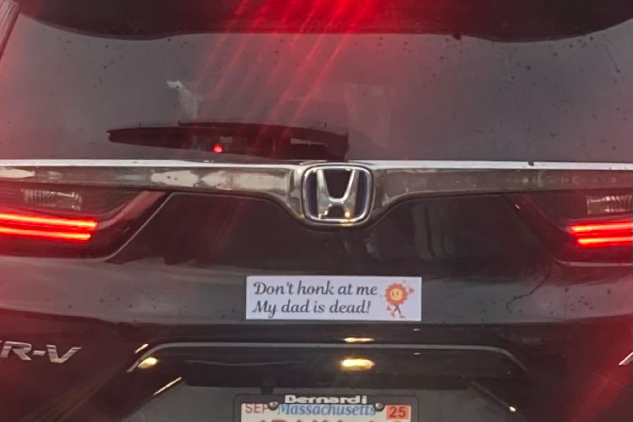 “Don’t honk at me my dad is dead!” bumper sticker