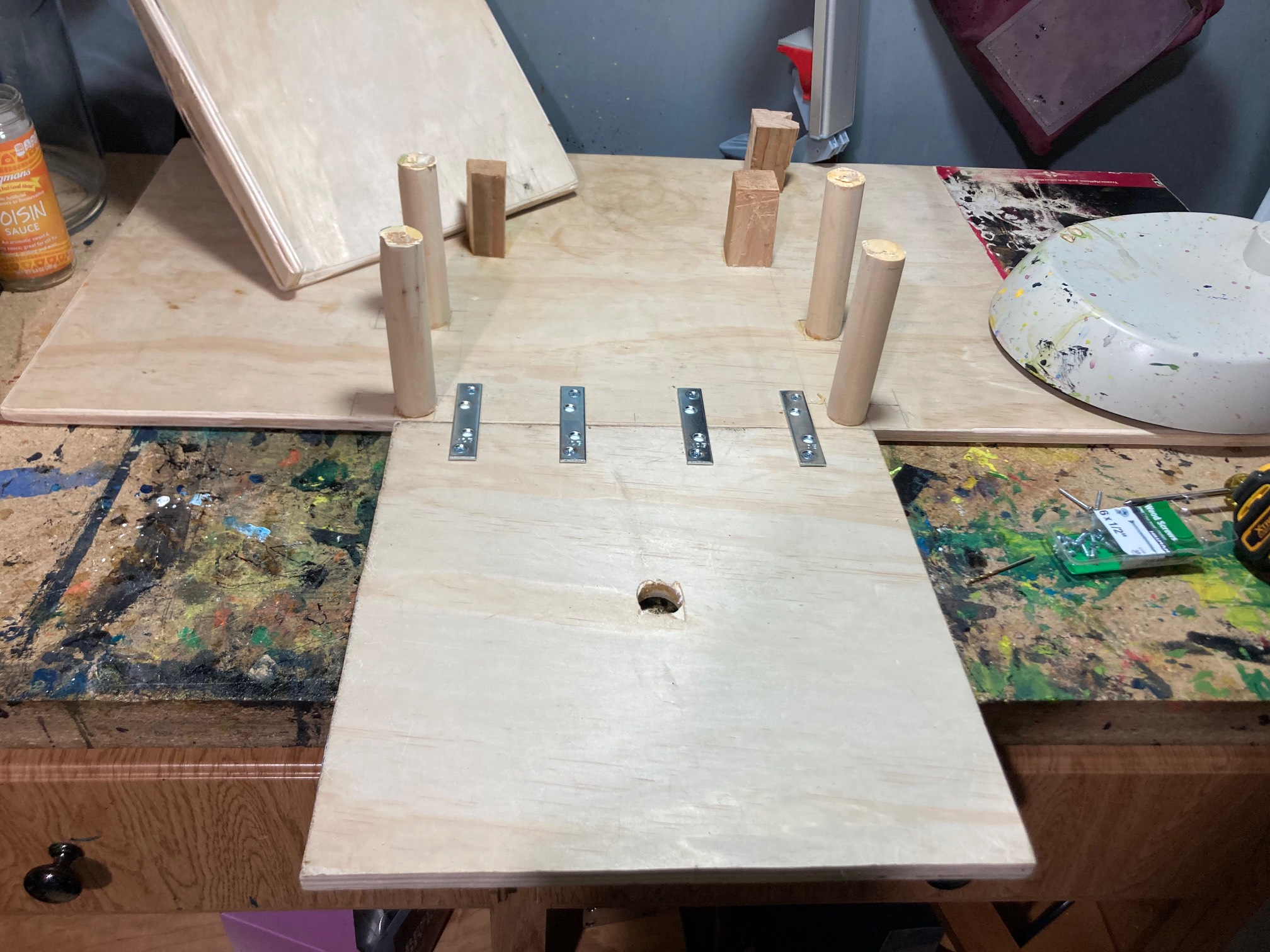 Board with new board attached by metal strips