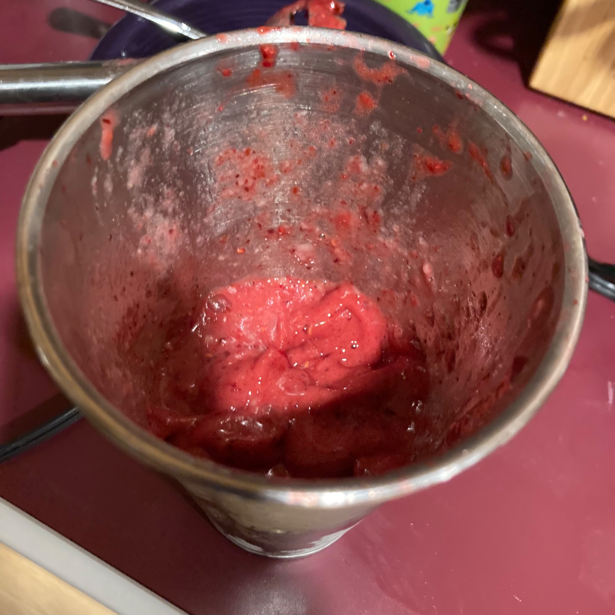 Red smooth in metal cup