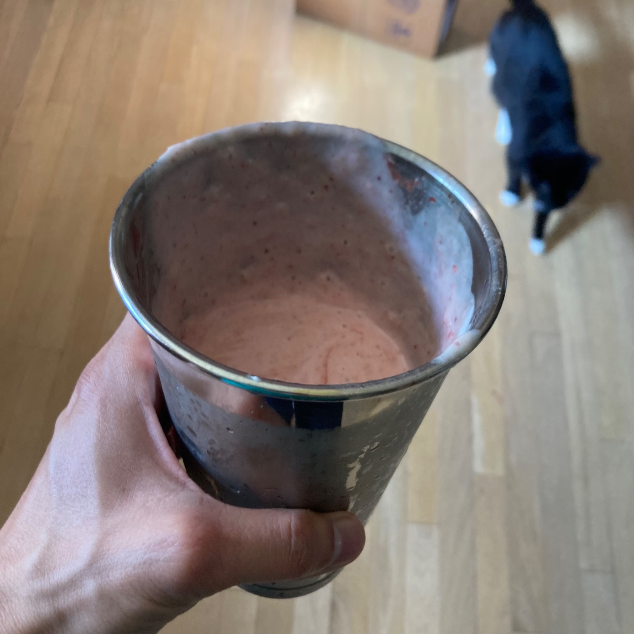 Metal cup with pink drink