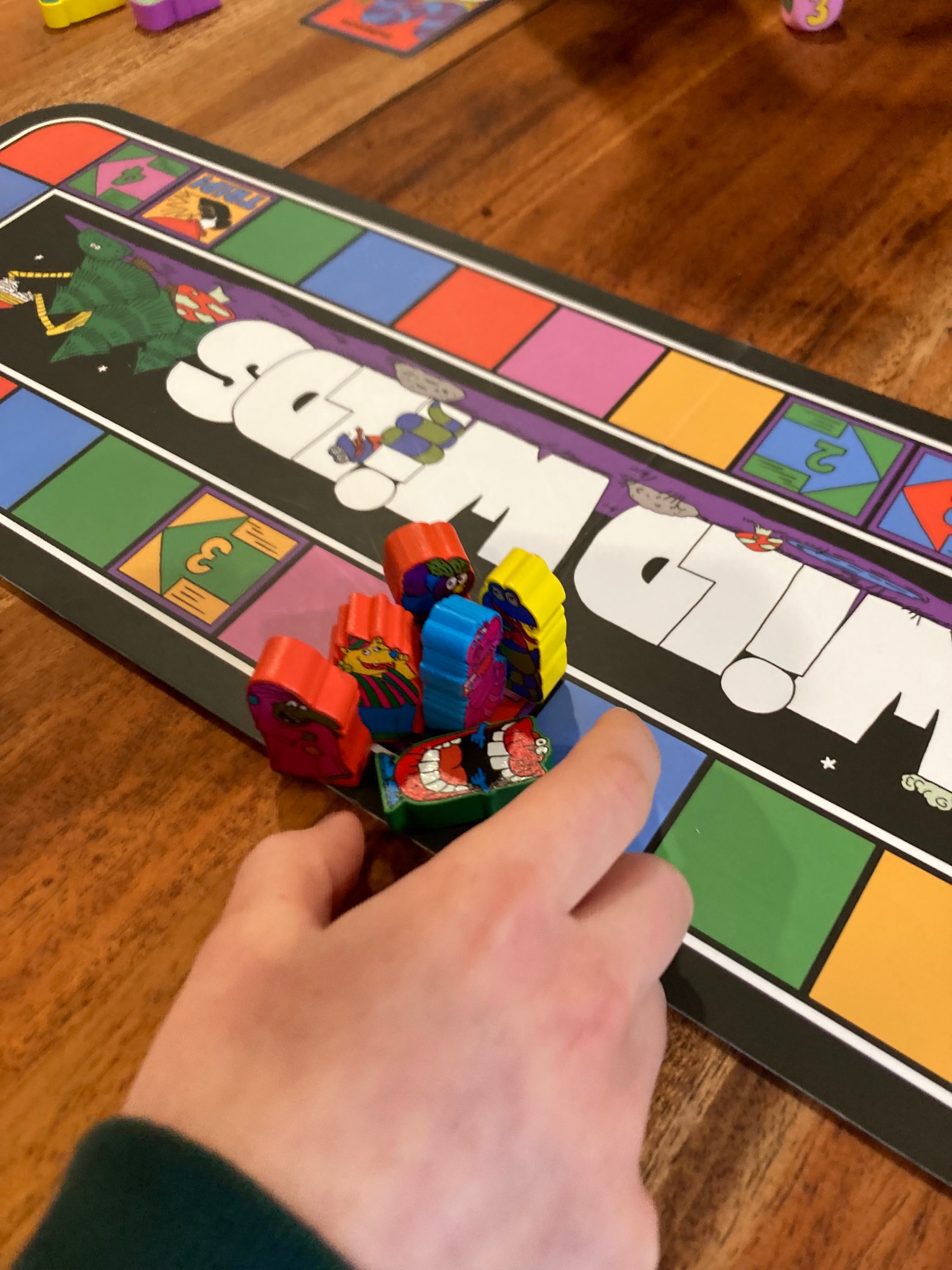 Six character markers on one space on a board