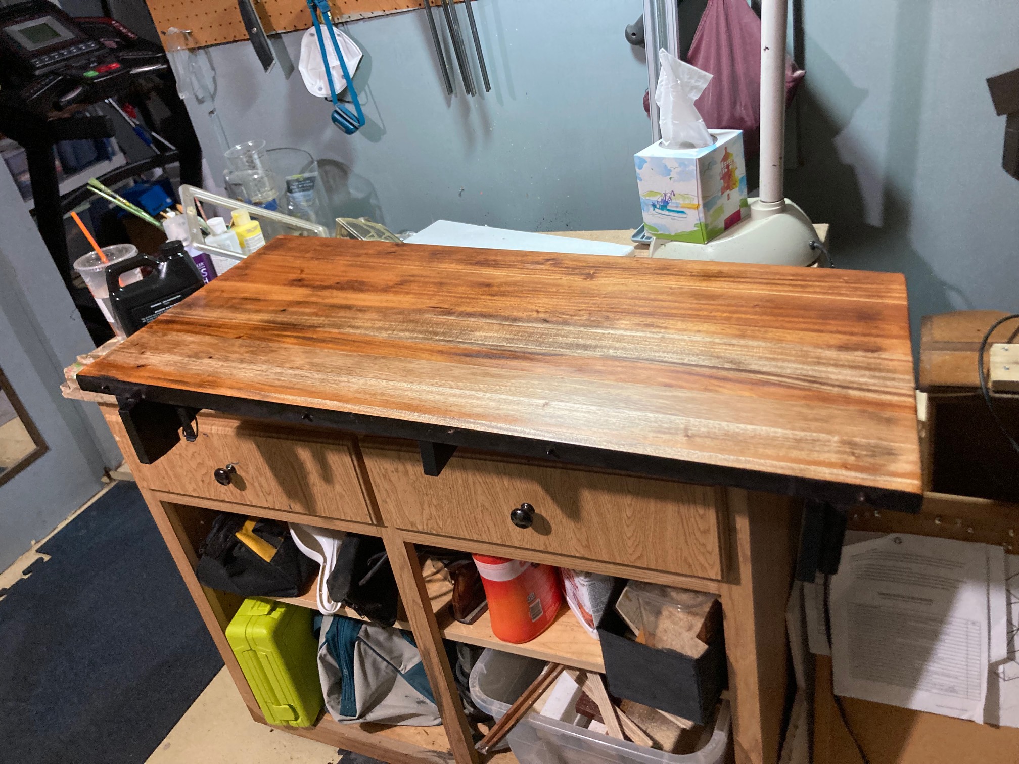 Table top piece on workbench with oil on it