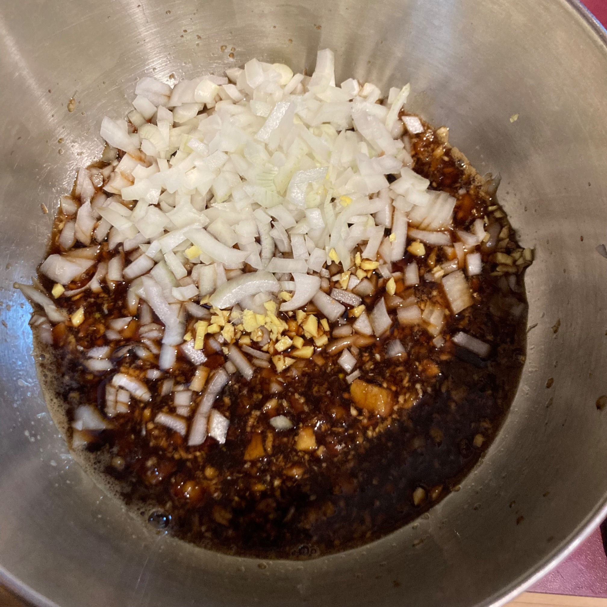 Onion, ginger, garlic in soy sauce and other sauces