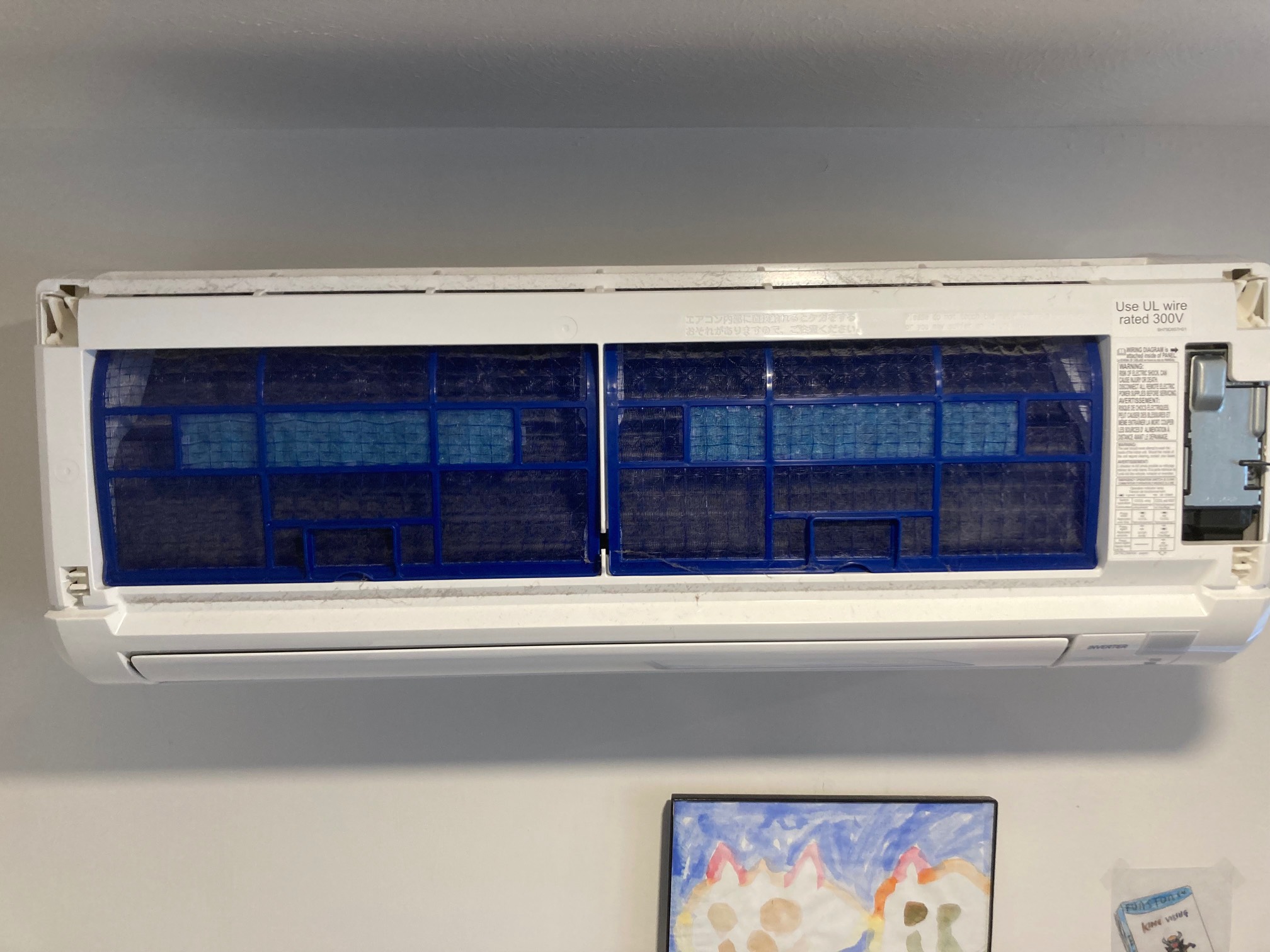 Opened mini-split with filters inside