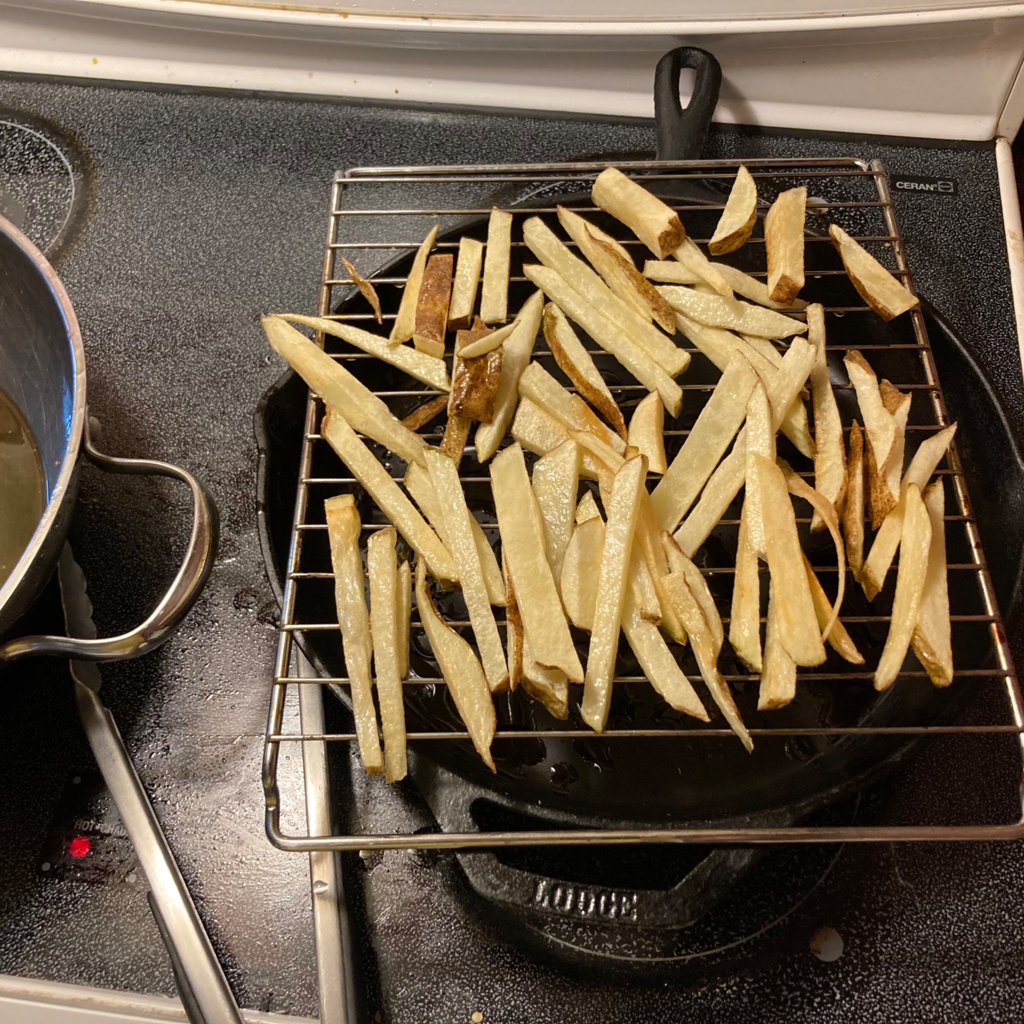 Fry pass 1 of a small amount of fries. If it were not for my friend Wayne, I would have never realiz