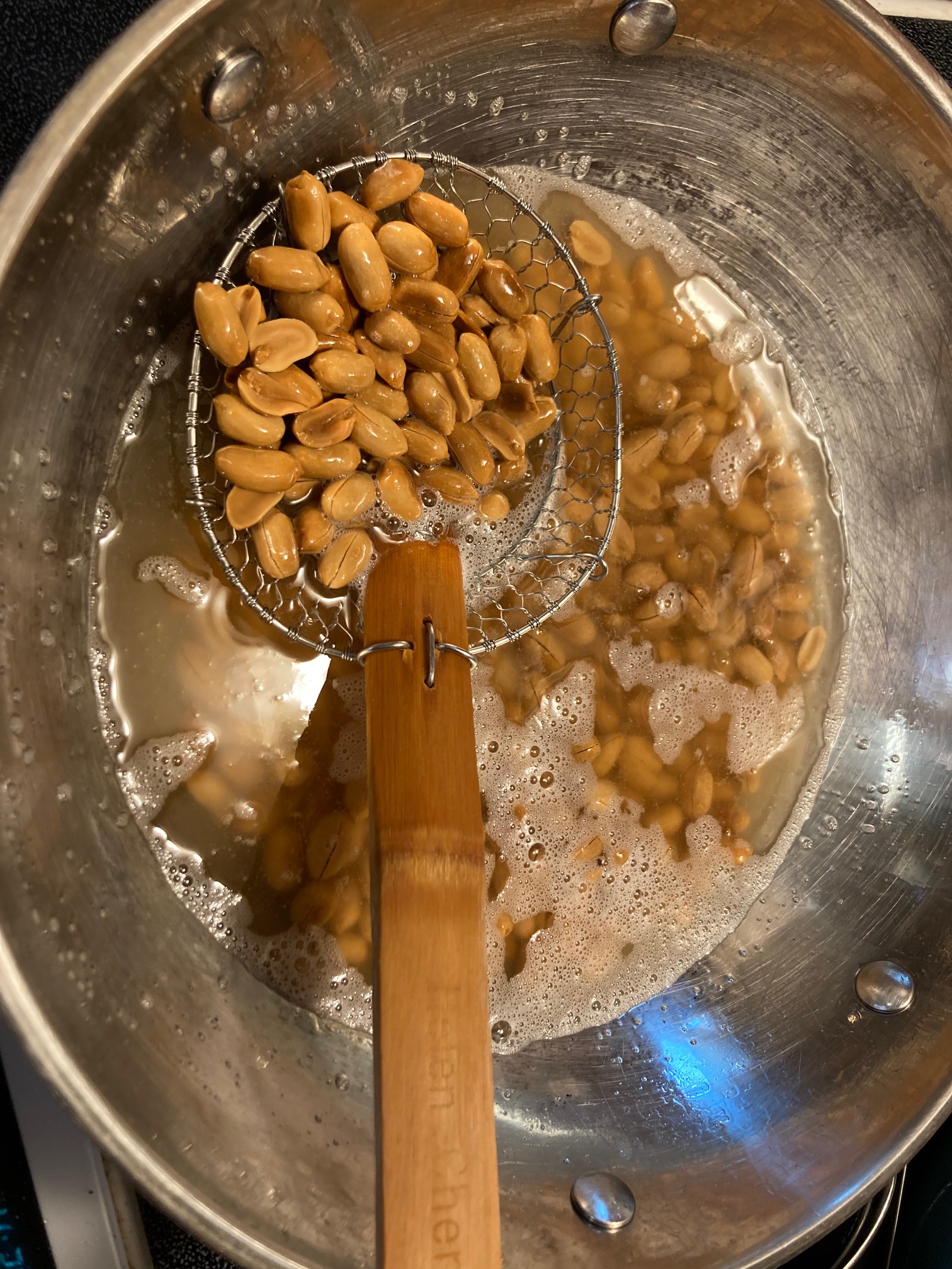 Well, I burned the peanuts again, but only slightly this time! Oil heats fast.