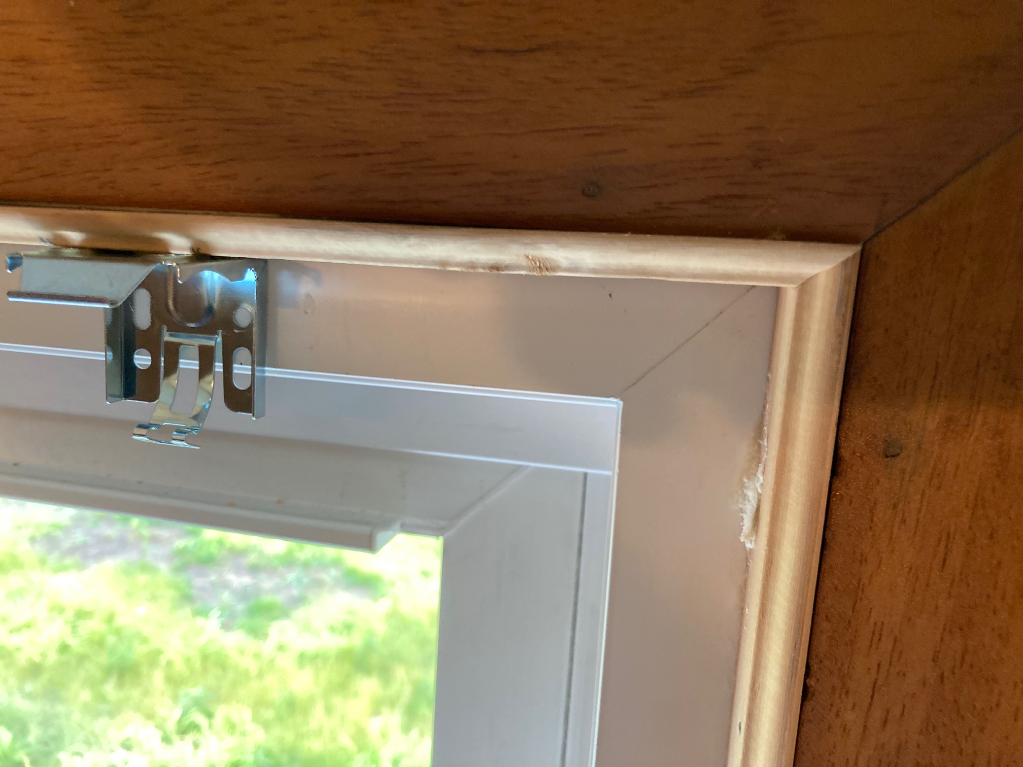 Argh, this veneer. Every time I notice something new about our windows, it’s something I hate.